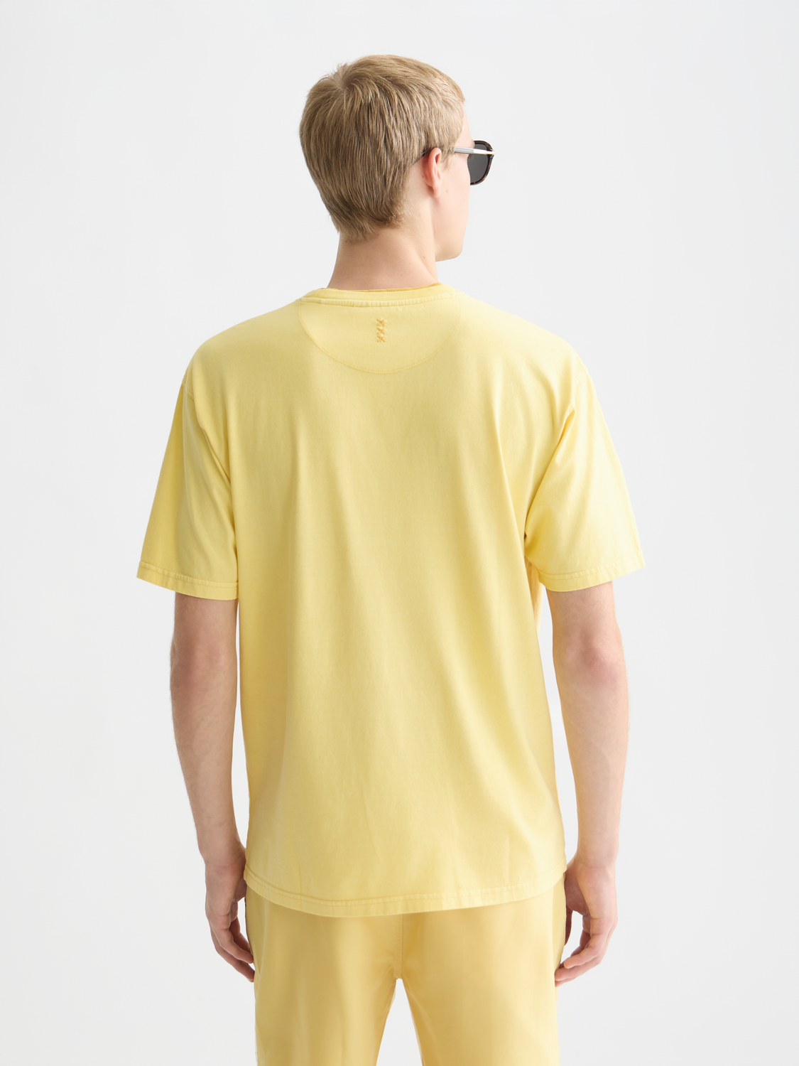 Scarlet garment-dyed short-sleeve T-shirt by Scotch & Soda, showcasing a relaxed fit and soft fabric with a back view.