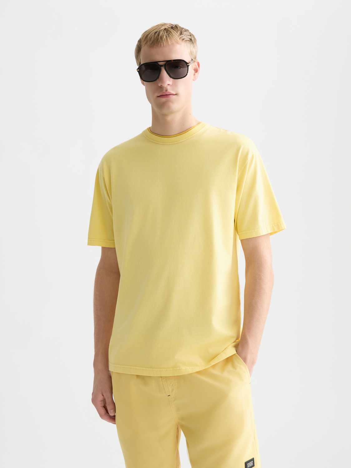 Light blue Scotch & Soda short sleeve garment-dyed t-shirt with a crew neckline and minimal design, casual and comfortable.