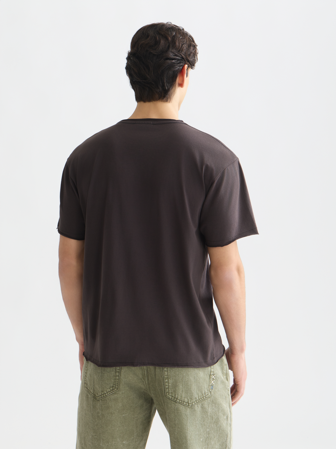 SCOTCH & SODA raw edge short sleeve t-shirt with distressed hem, casual fit, shown from the back in this product image.