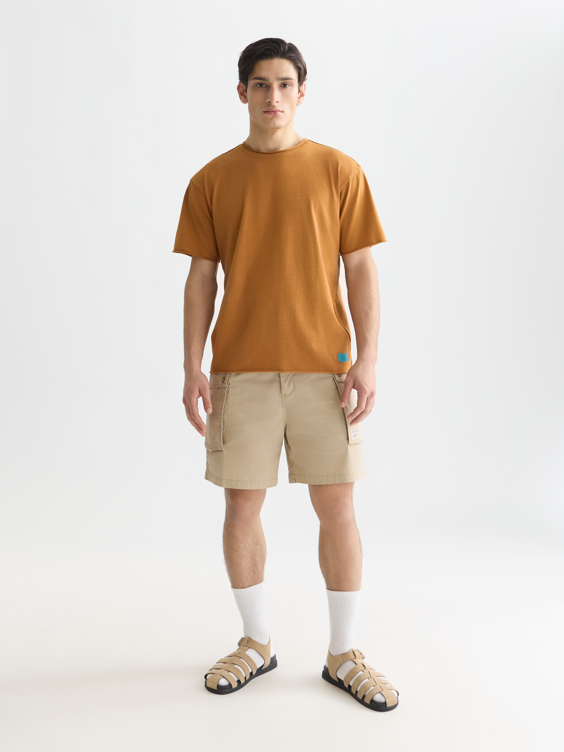 Light beige Scotch & Soda raw edge short-sleeve T-shirt with a relaxed fit and casual style.