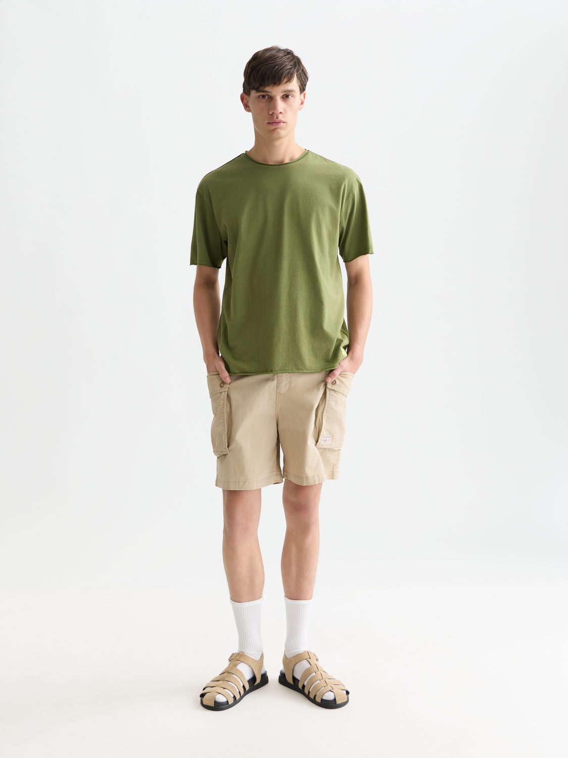 Raw edge Scotch & Soda short sleeve t-shirt with distressed neckline and casual fit, displayed on a white background.