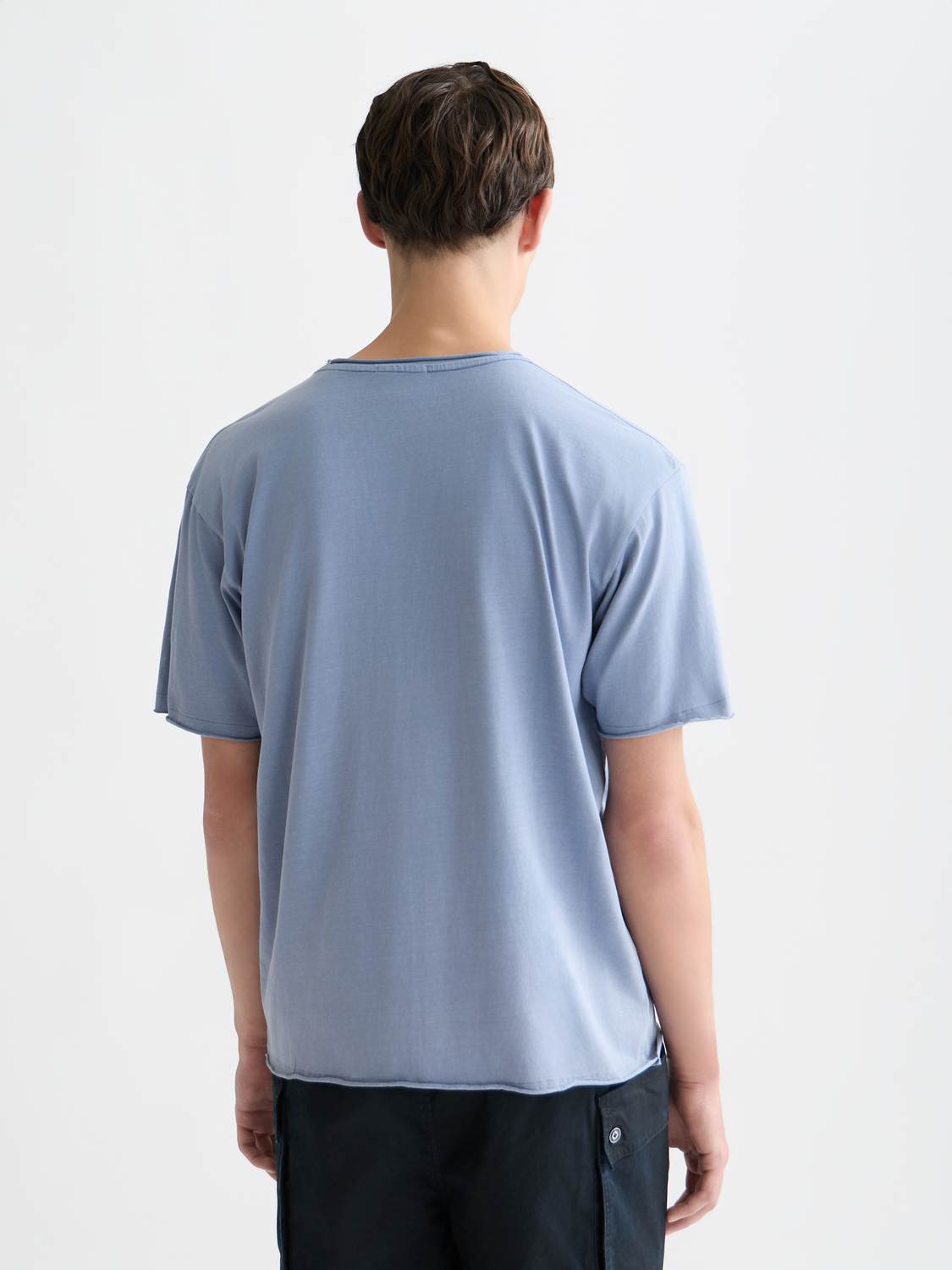 Raw edge Scotch & Soda short sleeve T-shirt shown from the back with a relaxed fit and casual style.