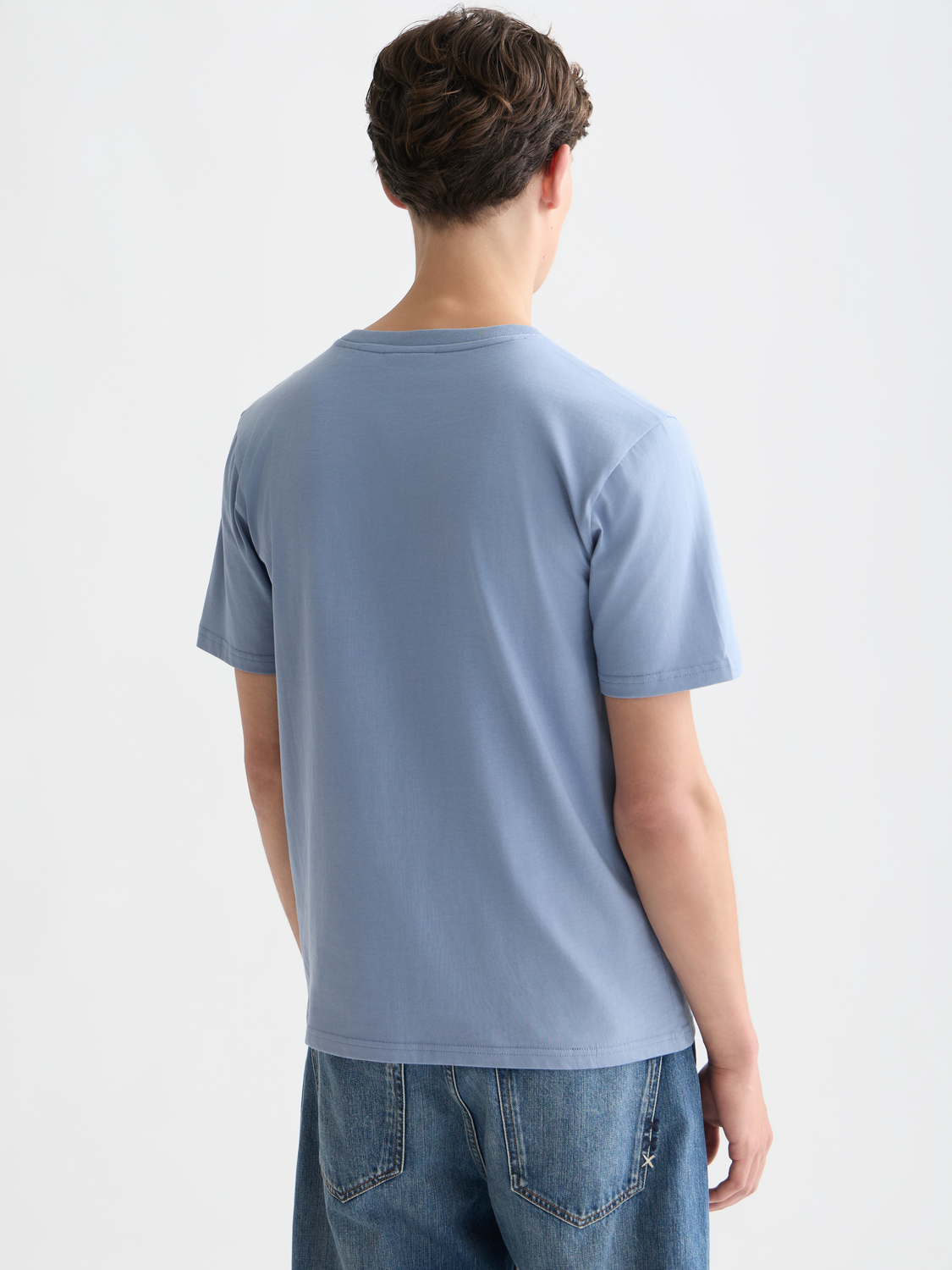 SCOTCH & SODA short sleeve artwork t-shirt featuring a colorful printed design on front, casual fit, and crew neckline.