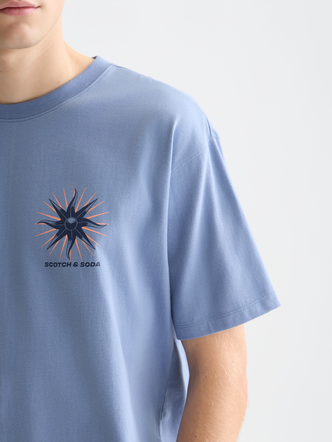 Short sleeve Scotch & Soda artwork t-shirt featuring a colorful, artistic print on soft fabric.