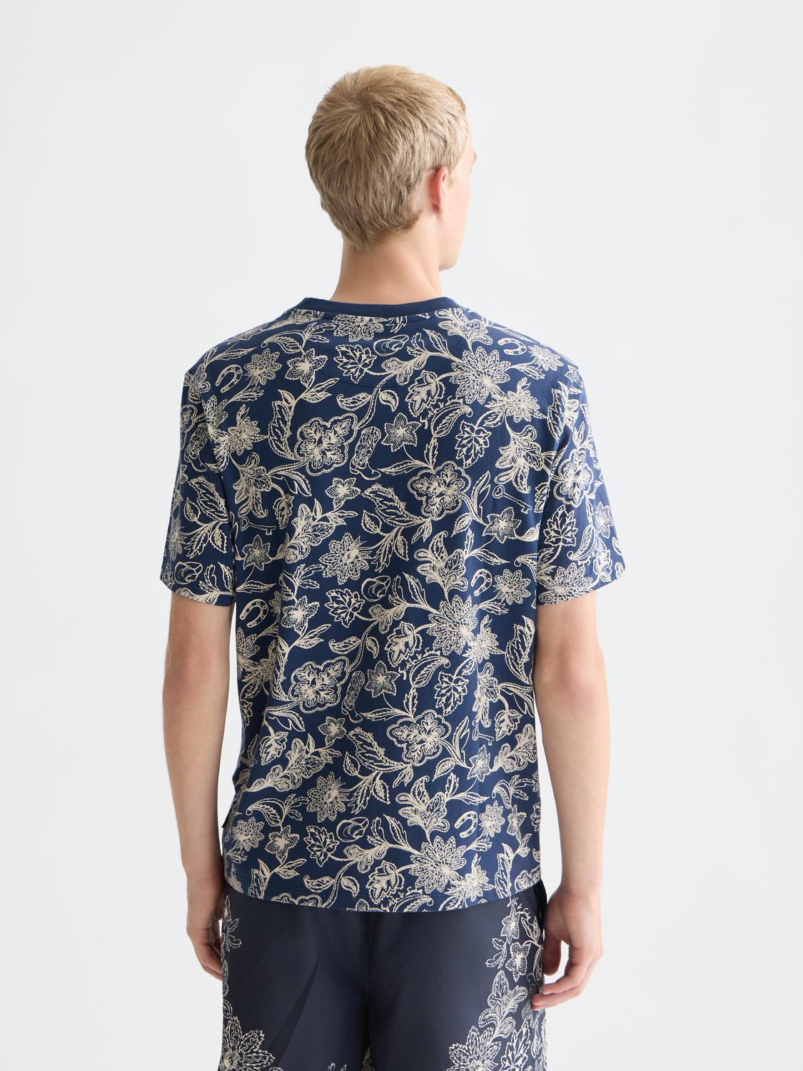 Printed SCOTCH & SODA short sleeve t-shirt with colorful graphic design, shown from the back.