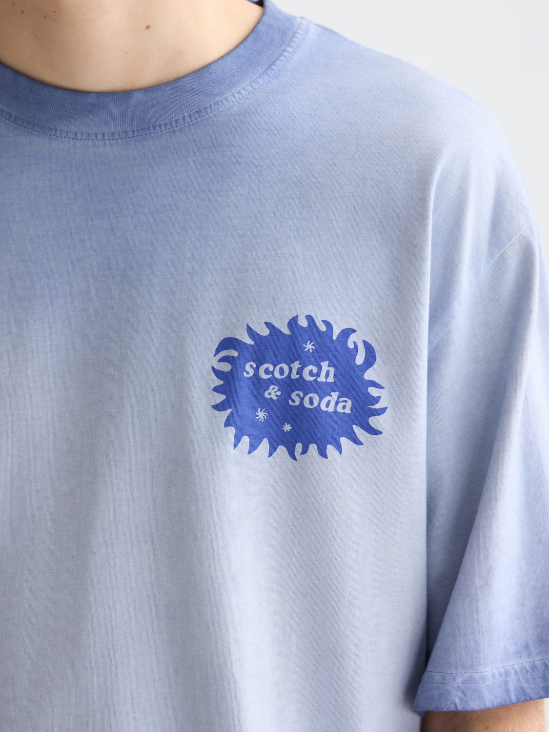 SCOTCH & SODA artwork short-sleeve t-shirt with colorful graphic design on front, casual men's summer tee.