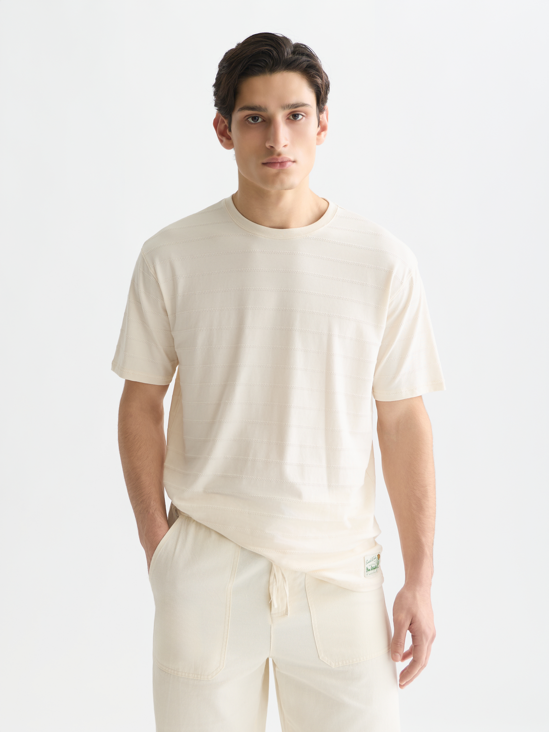 Scarlet red Scotch & Soda jacquard short sleeve t-shirt with intricate woven pattern and crew neckline.