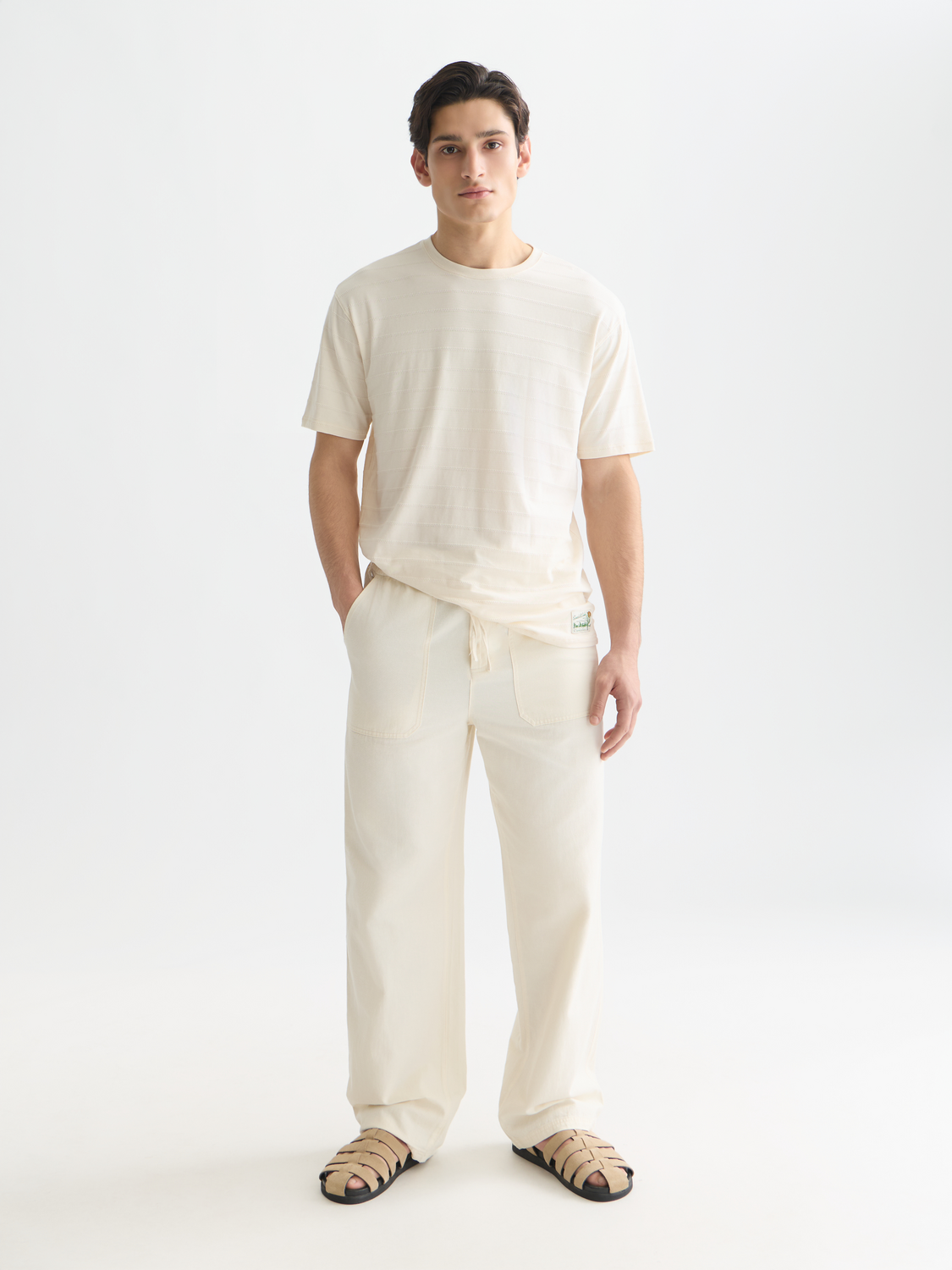 SCOTCH & SODA jacquard short-sleeve t-shirt with intricate woven pattern, displayed on a plain background.