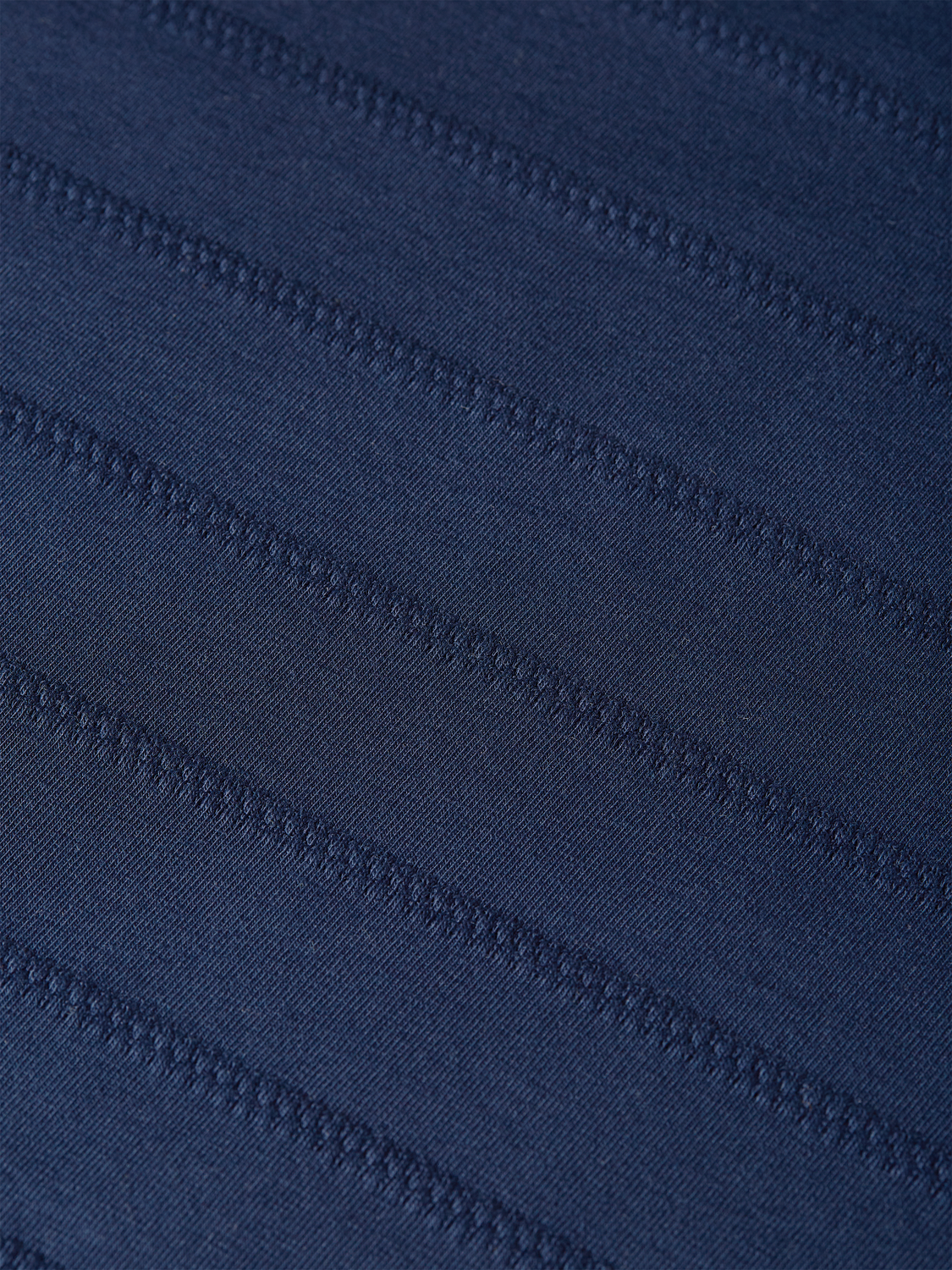 Scarlet and navy Scotch & Soda jacquard short-sleeve T-shirt with intricate woven pattern and crew neck design.