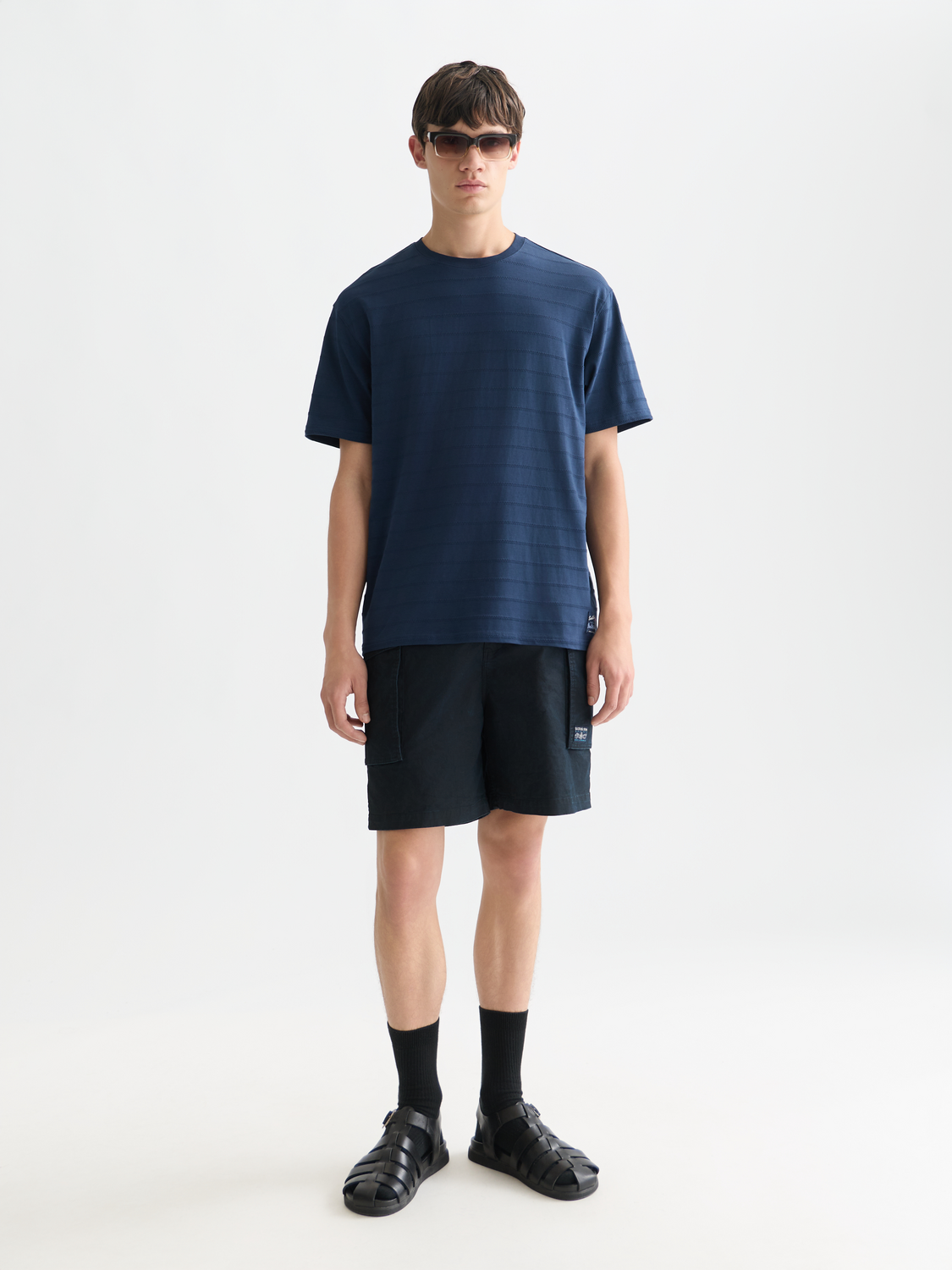 SCOTCH & SODA jacquard short sleeve t-shirt with patterned fabric and crew neck design.