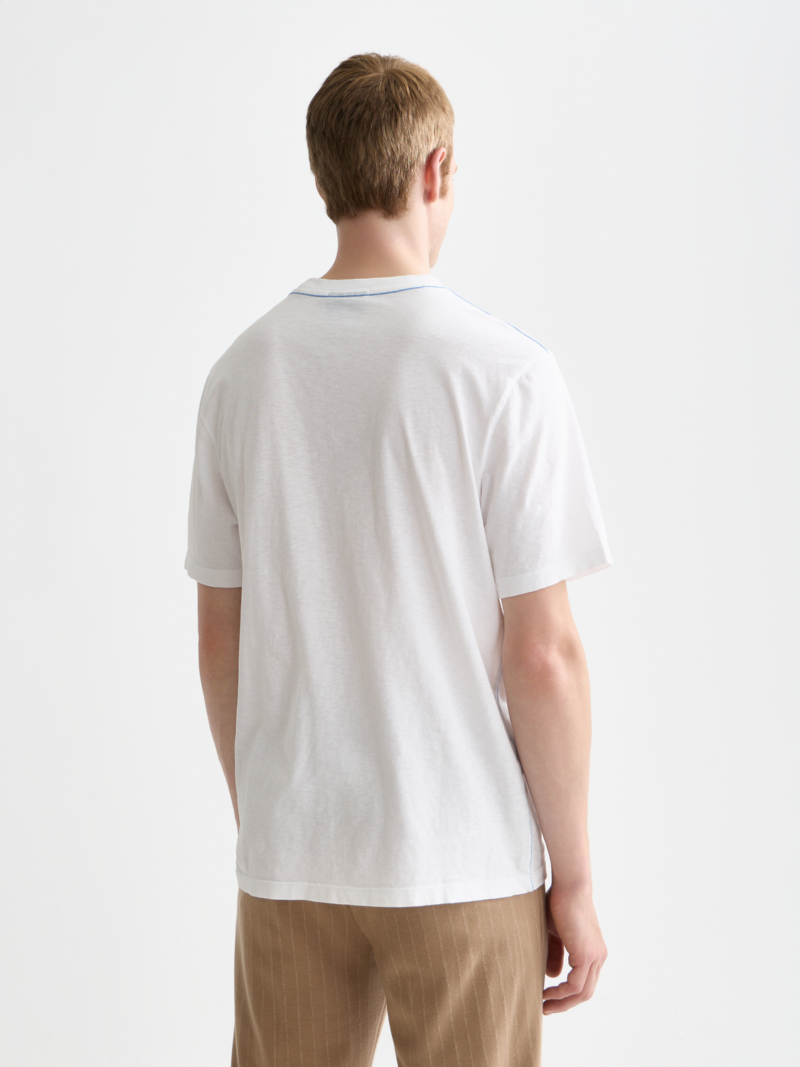 SCOTCH & SODA artwork short sleeve T-shirt with colorful graphic design on black fabric.