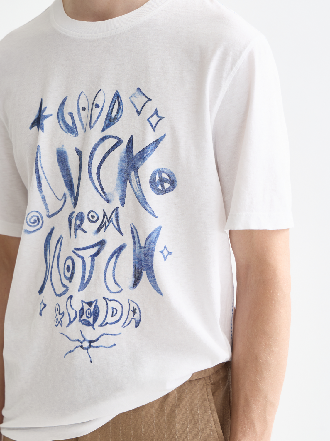 Scotch & Soda short sleeve artwork t-shirt with colorful graphic design on soft fabric, casual men's fashion tee.