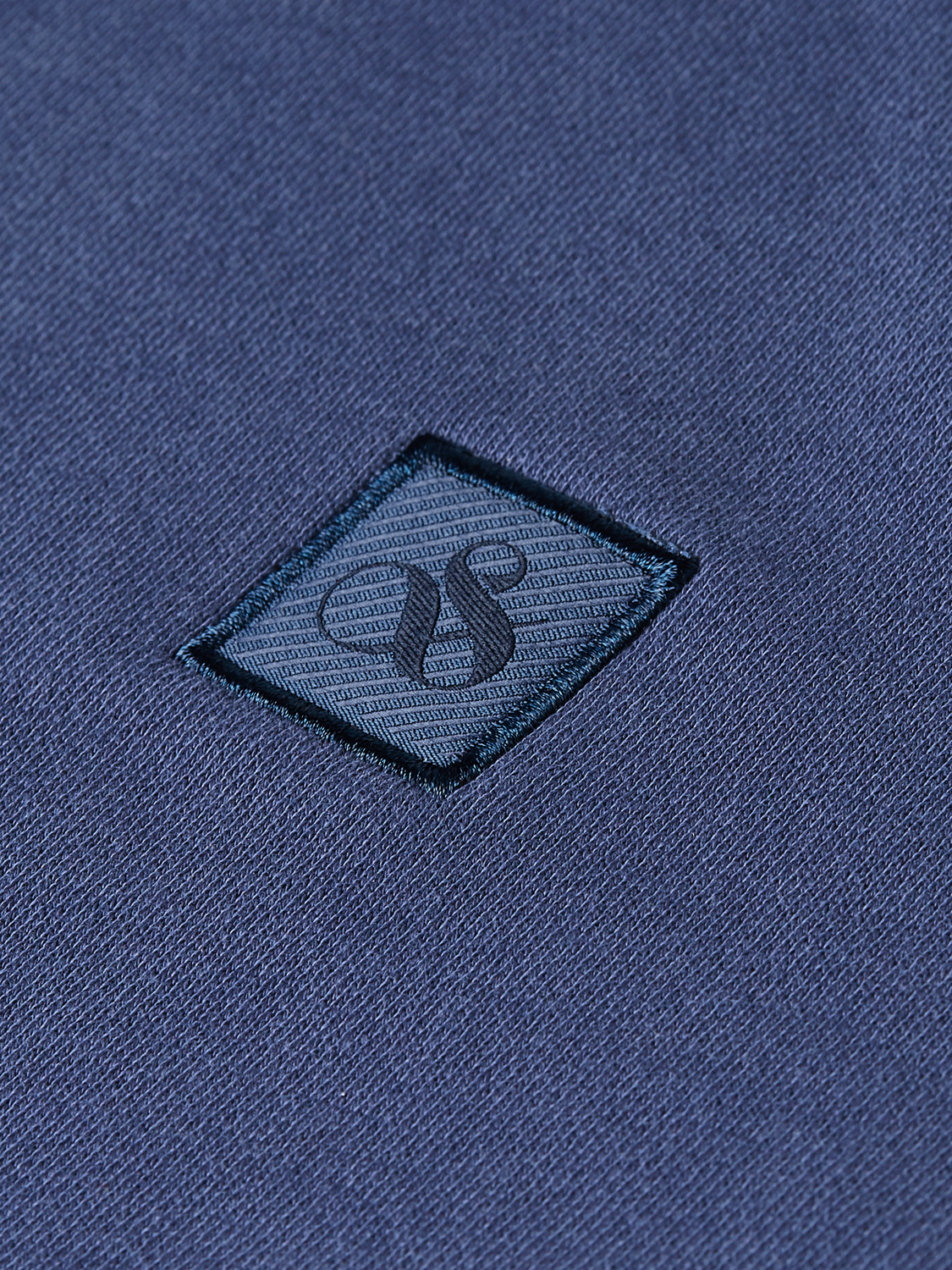 Gray zip-through hoodie with Scotch & Soda logo, featuring a front zipper, hood, and casual sweats style.