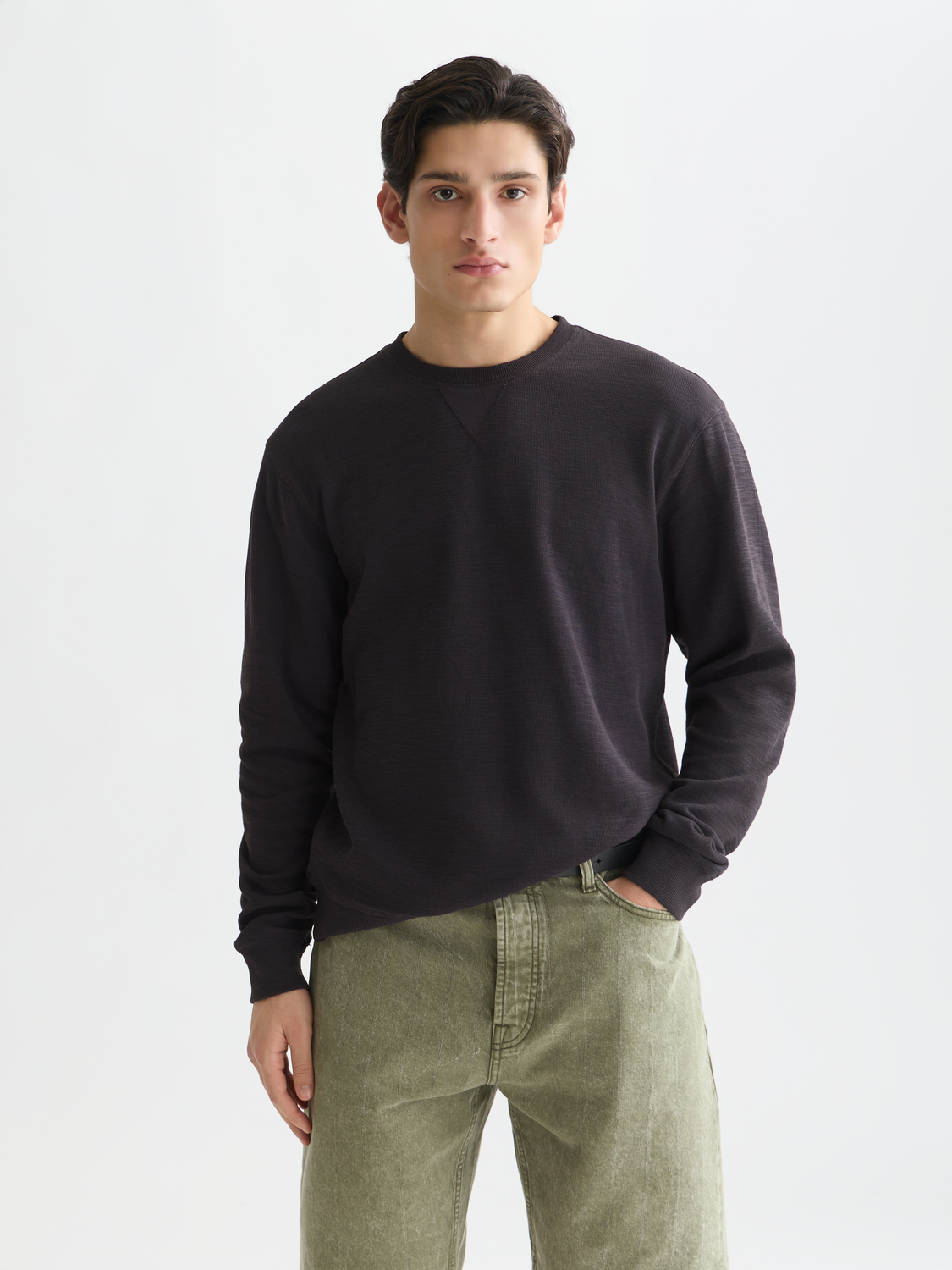 Dark gray garment-dyed sweatshirt from Scotch & Soda, soft cotton sweats with a relaxed fit and ribbed cuffs.