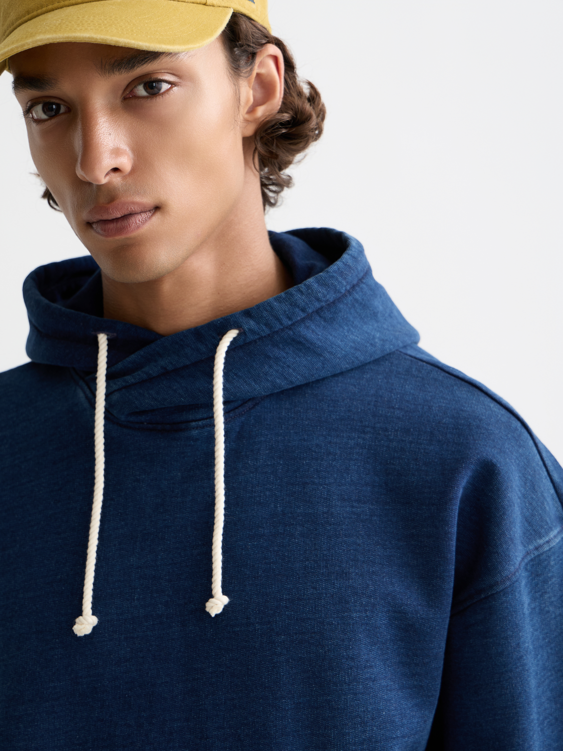 Indigo hoodie from Scotch & Soda, casual sweats with a comfortable fit and hood, shown in a relaxed style.
