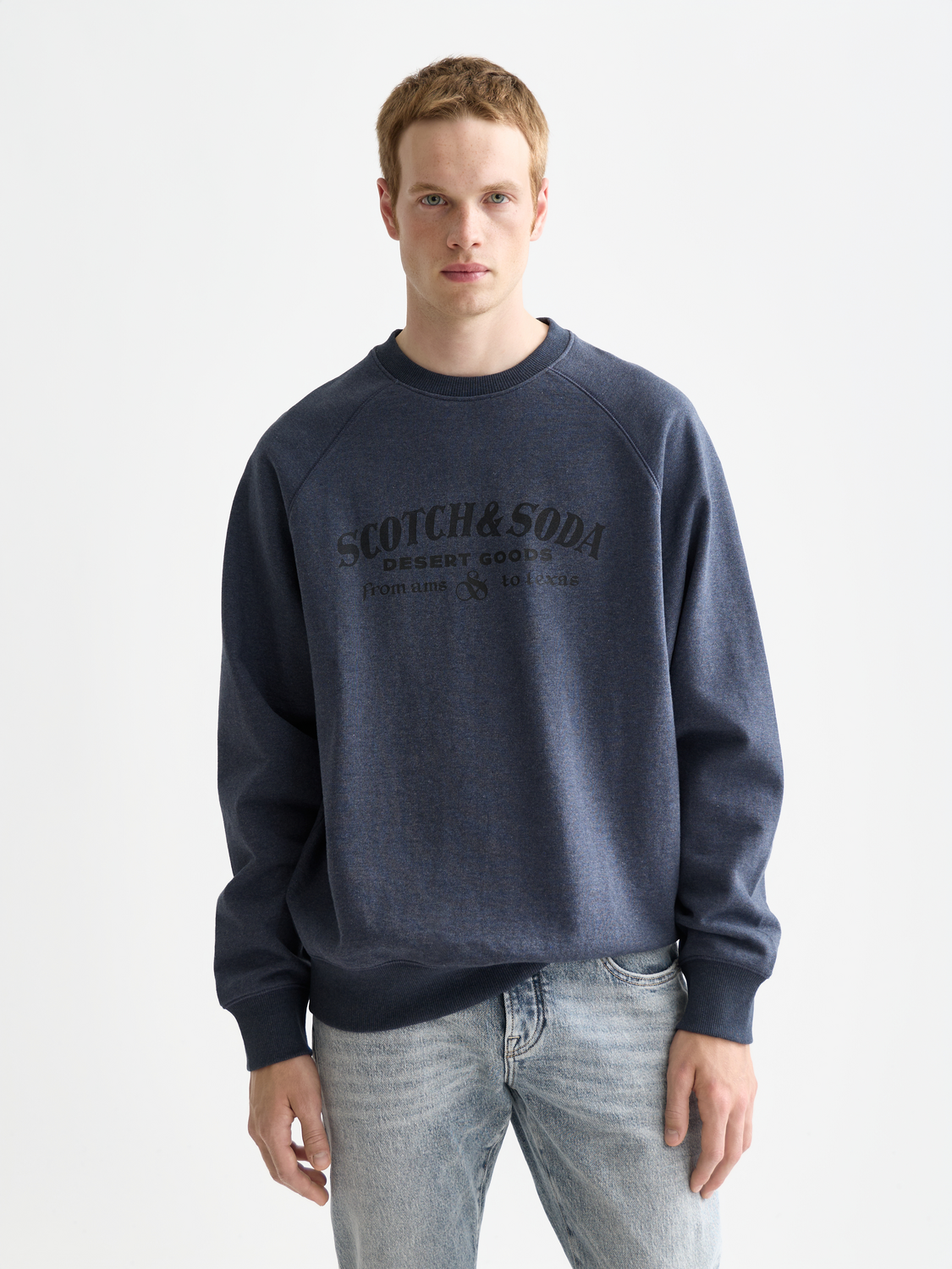 Scotch & Soda Artwork sweatshirt featuring printed design, soft fabric, and casual fit, displayed on a hanger.