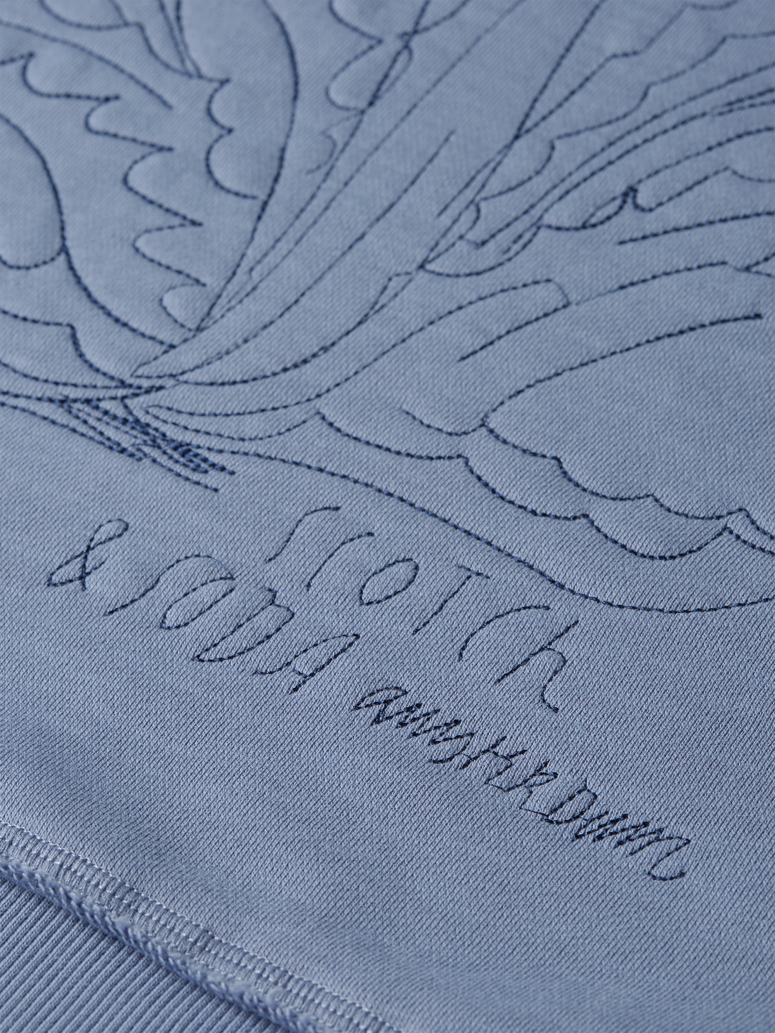 Embroidery detail on Scotch & Soda sweatshirt, casual sweats with colorful stitched design, soft fabric and relaxed fit.