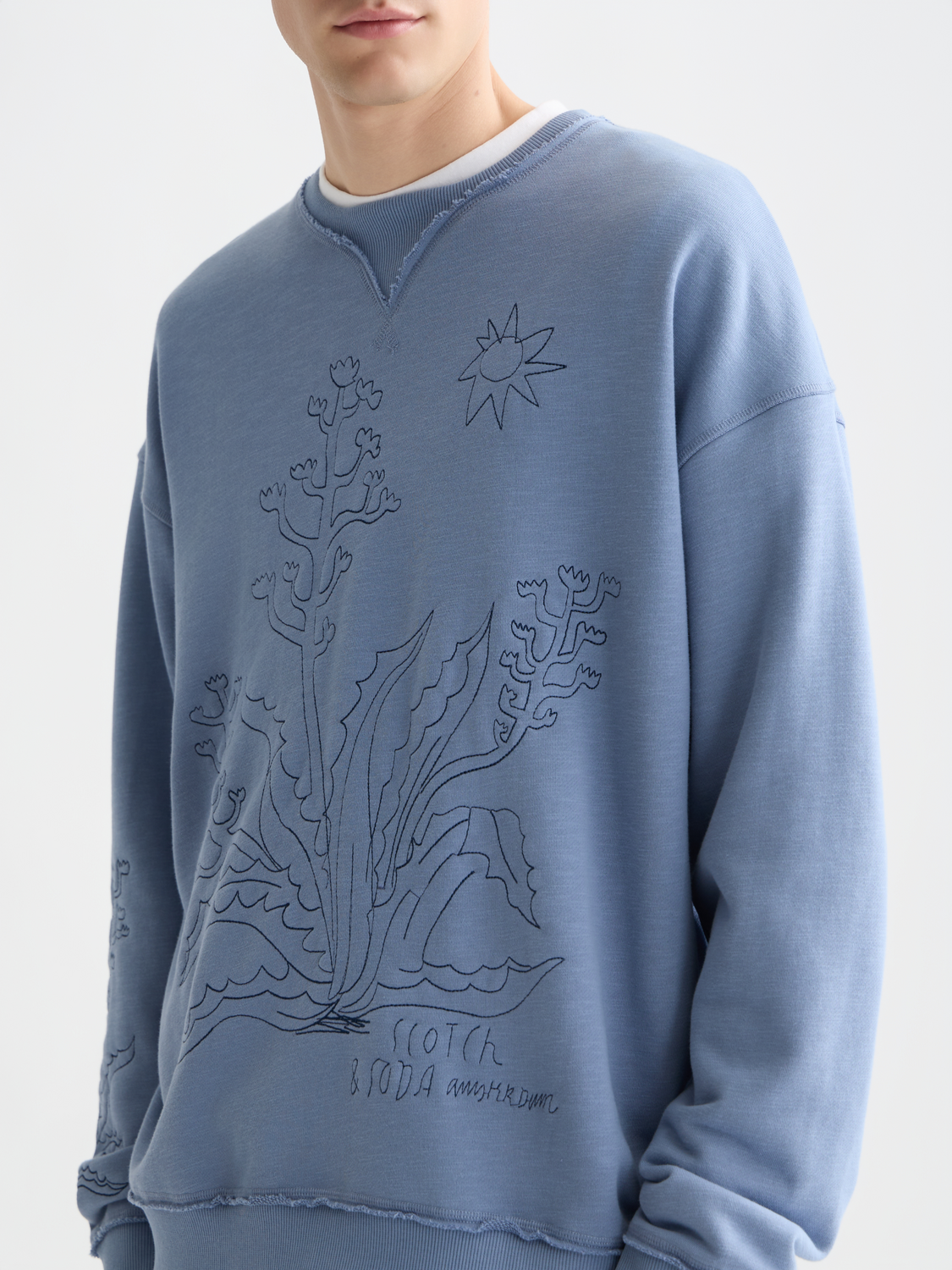 Embroidered sweatshirt by Scotch & Soda featuring detailed embroidery on soft, casual sweats for a stylish look.
