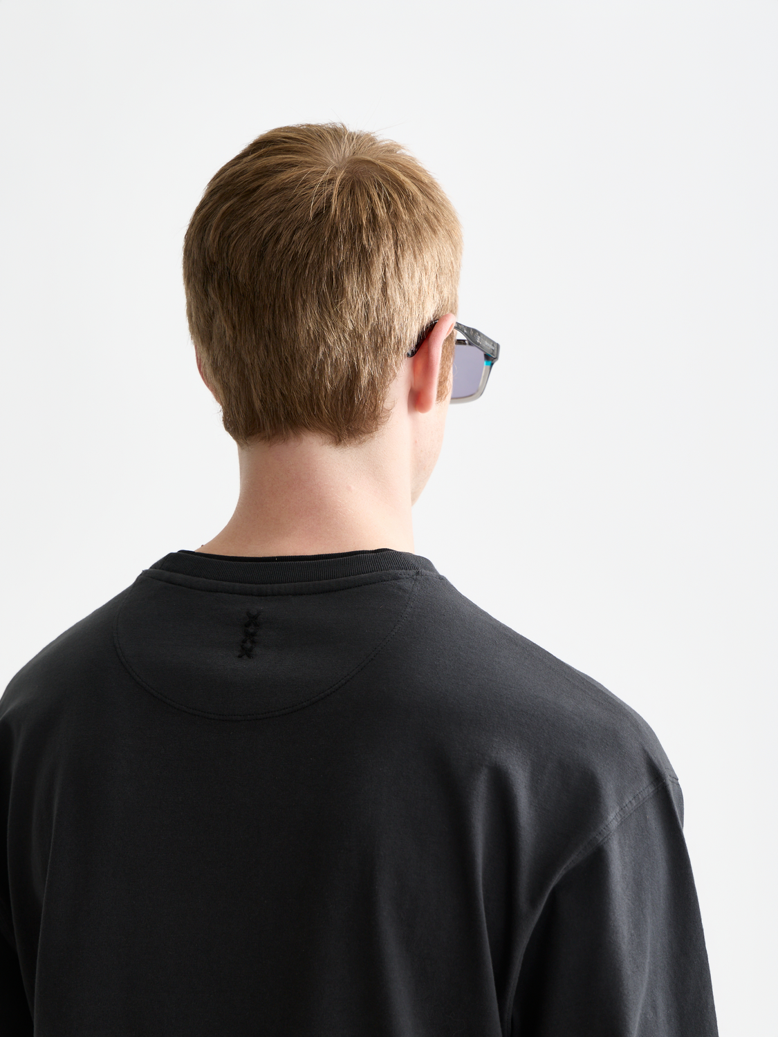 Long sleeve garment-dyed t-shirt by Scotch & Soda featuring a relaxed fit and rich color, displayed on a neutral background.