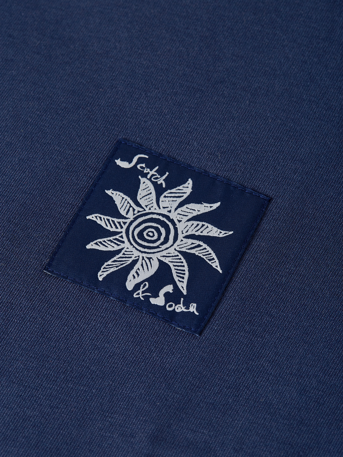 Long sleeve Scotch & Soda artwork T-shirt with colorful graphic print on soft fabric, displayed flat.