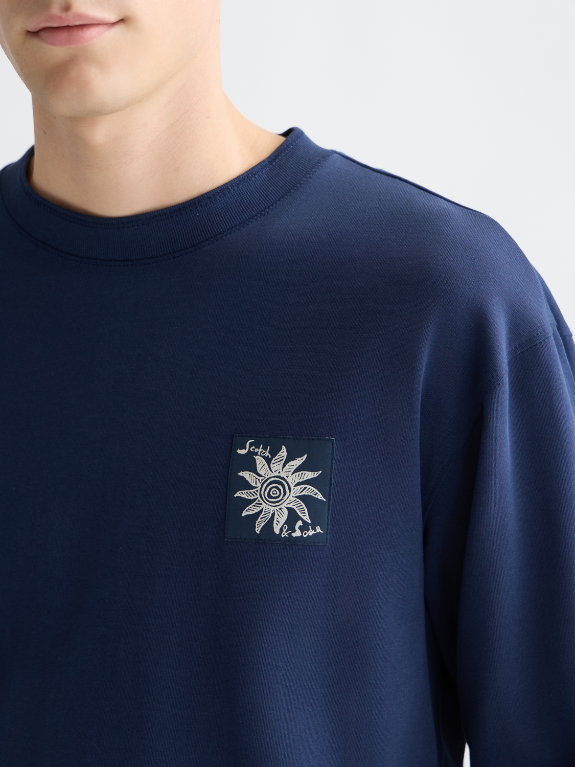 Long sleeve Scotch & Soda artwork T-shirt with colorful graphic design on soft fabric, casual fit for everyday wear.