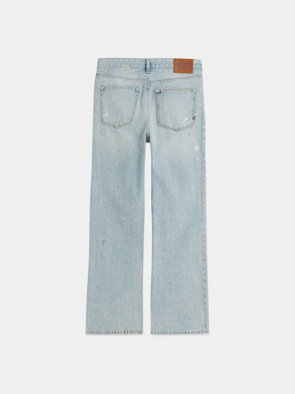 Wide-fit denim jeans by Scotch & Soda featuring classic five-pocket design and dark wash, shown on a model.