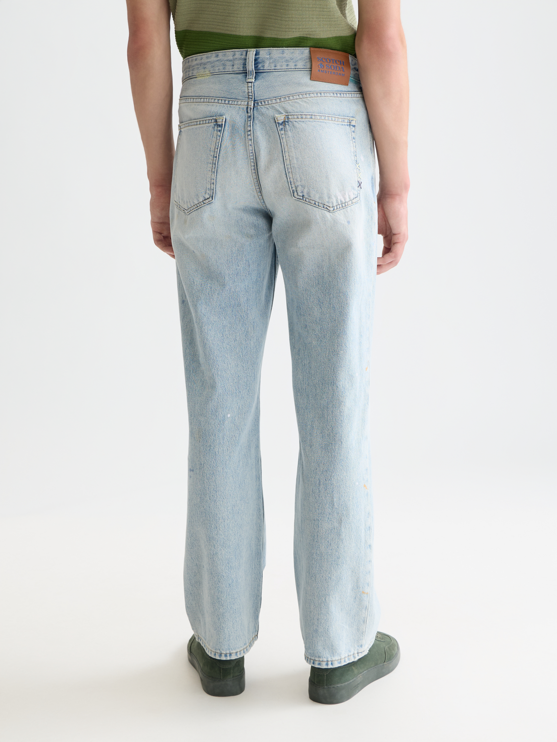 Wide-fit denim jeans by Scotch & Soda, showing the back view with classic stitching and relaxed fit.