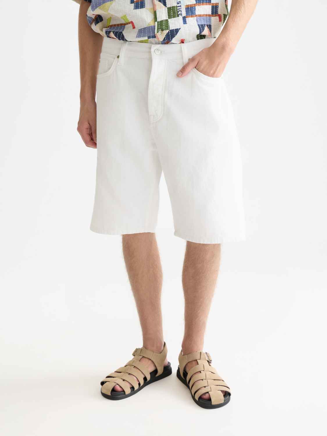 Denim loose-fit shorts by Scotch & Soda with a relaxed fit and classic denim wash, front view showing pockets and hem detail.