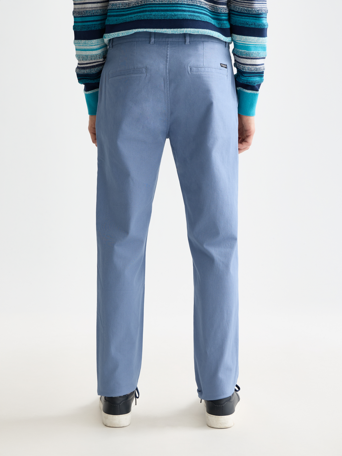 Scotch & Soda Stuart slim-fit chinos pants in dark denim, showing front view with pockets and belt loops.