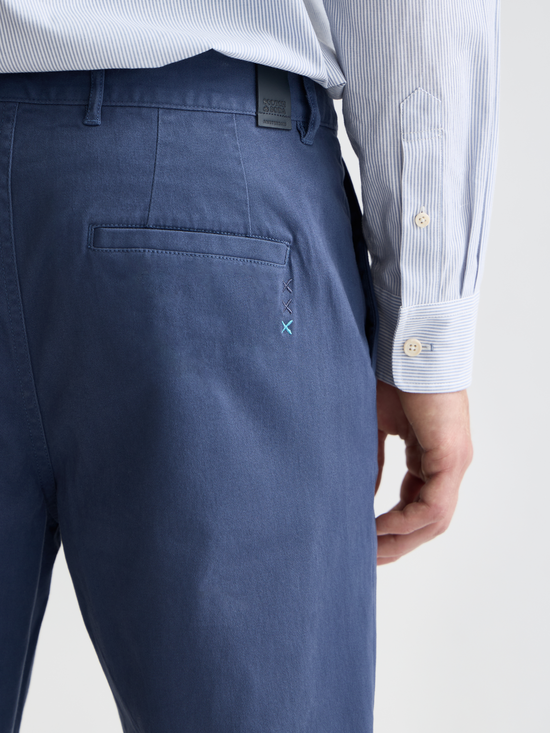 Drift tapered chinos by Scotch & Soda, stylish men's pants in a tapered fit with a classic design, shown in a neutral color.