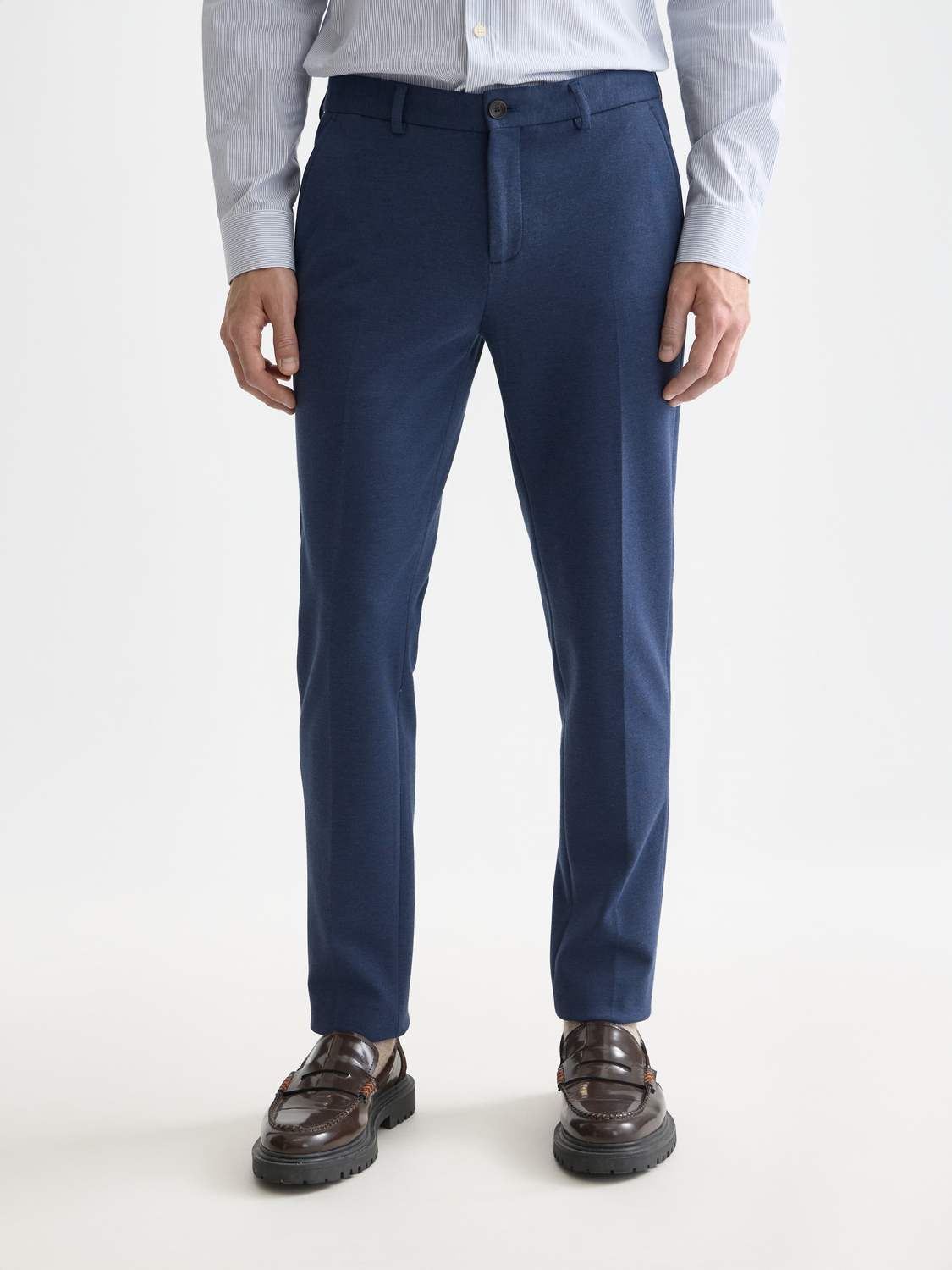 Slim-fit Mott chino pants by Scotch & Soda, featuring a streamlined design and classic fit in a neutral color.