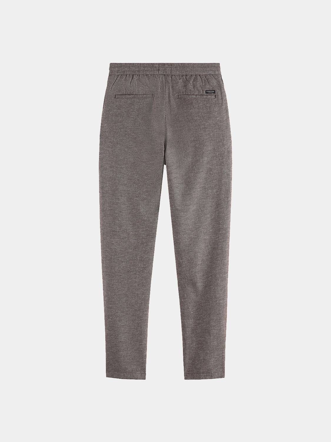 Black Warren joggers by Scotch & Soda, casual pants with a relaxed fit and elastic waistband, shown from the back.