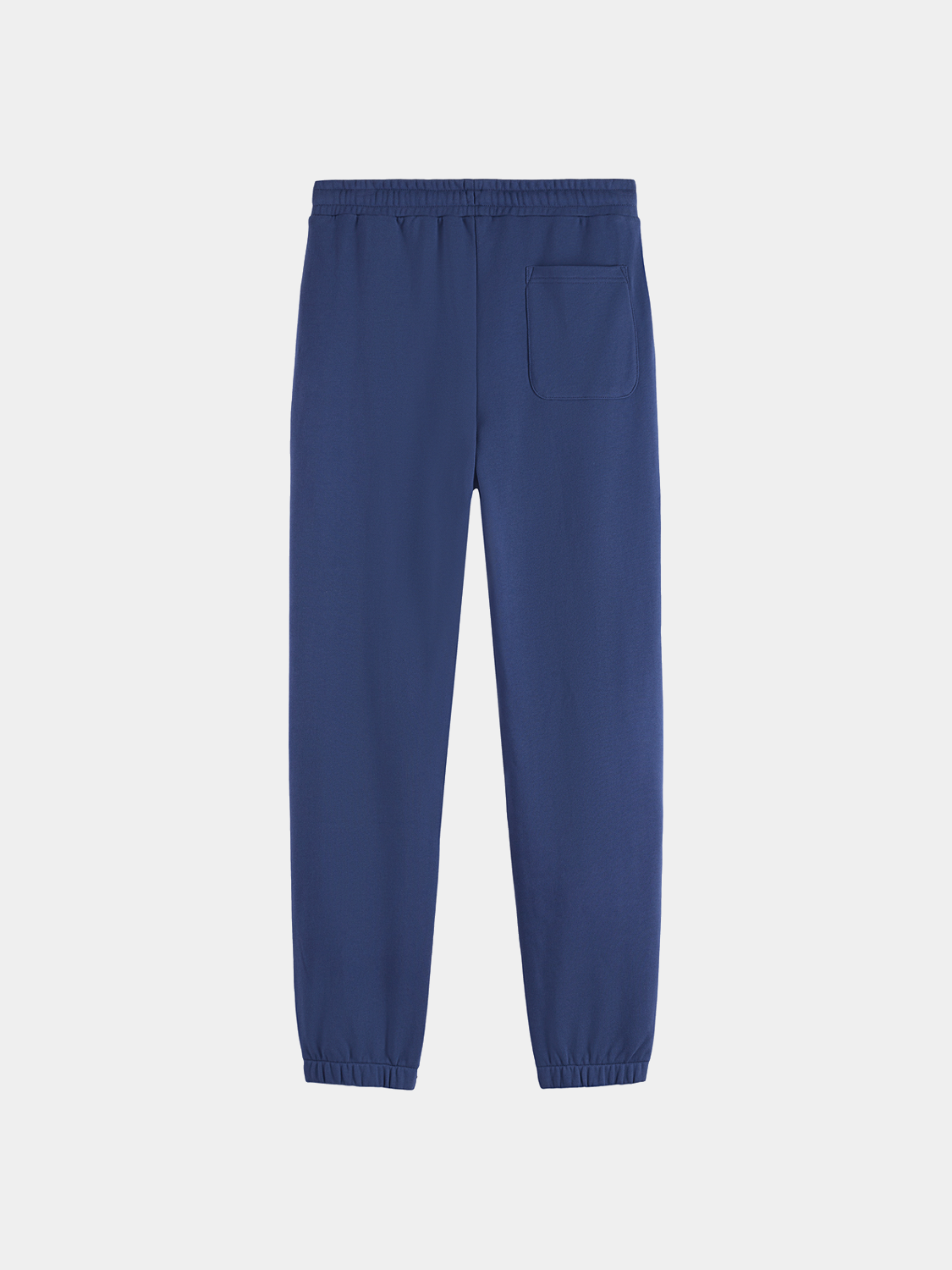 SCOTCH & SODA logo badge sweatpants showing the back view with a prominent logo patch on the waistband.