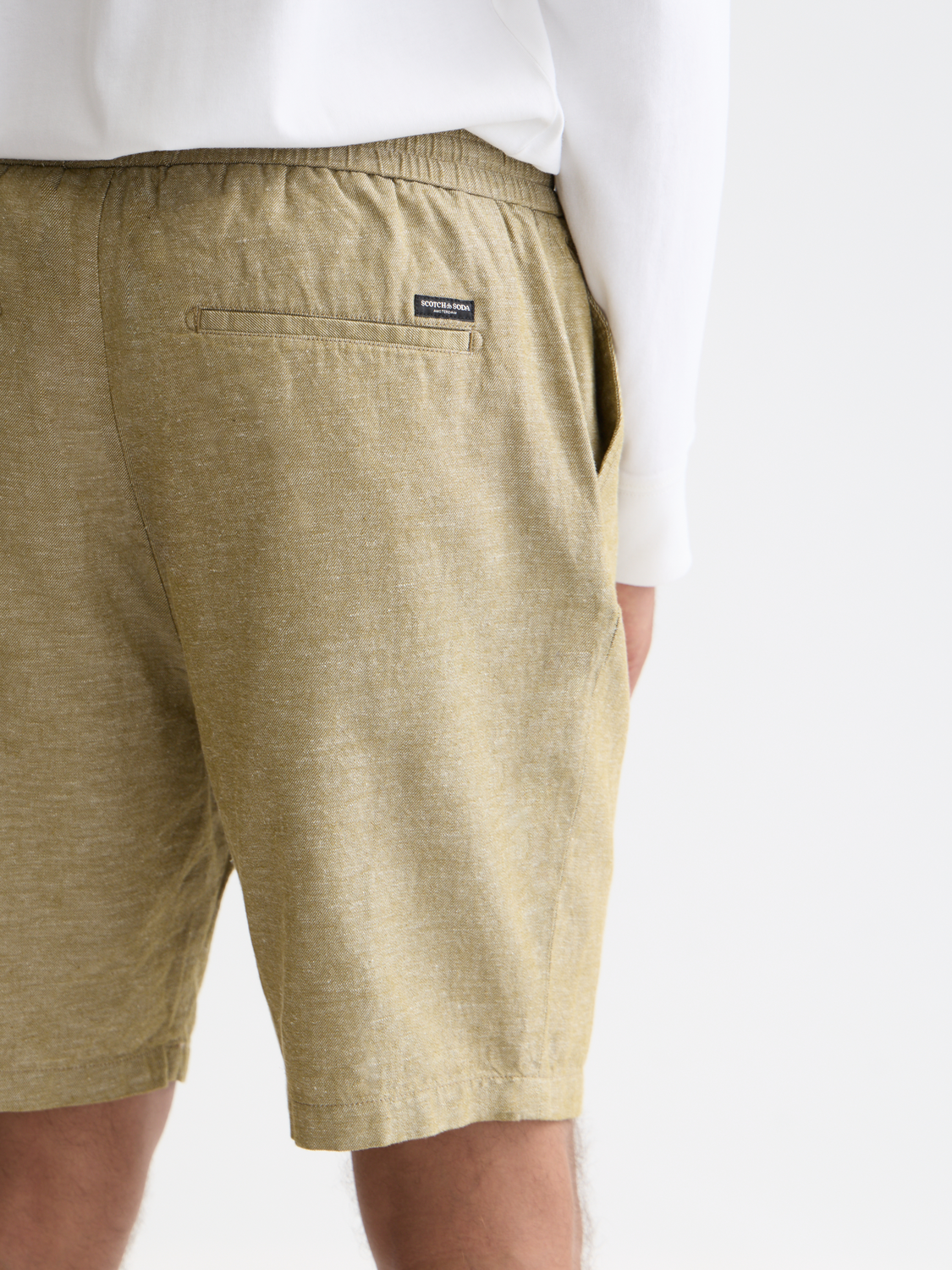 Fave cotton-linen shorts by Scotch & Soda, beige color, relaxed fit, front pockets, and casual style perfect for summer wear.