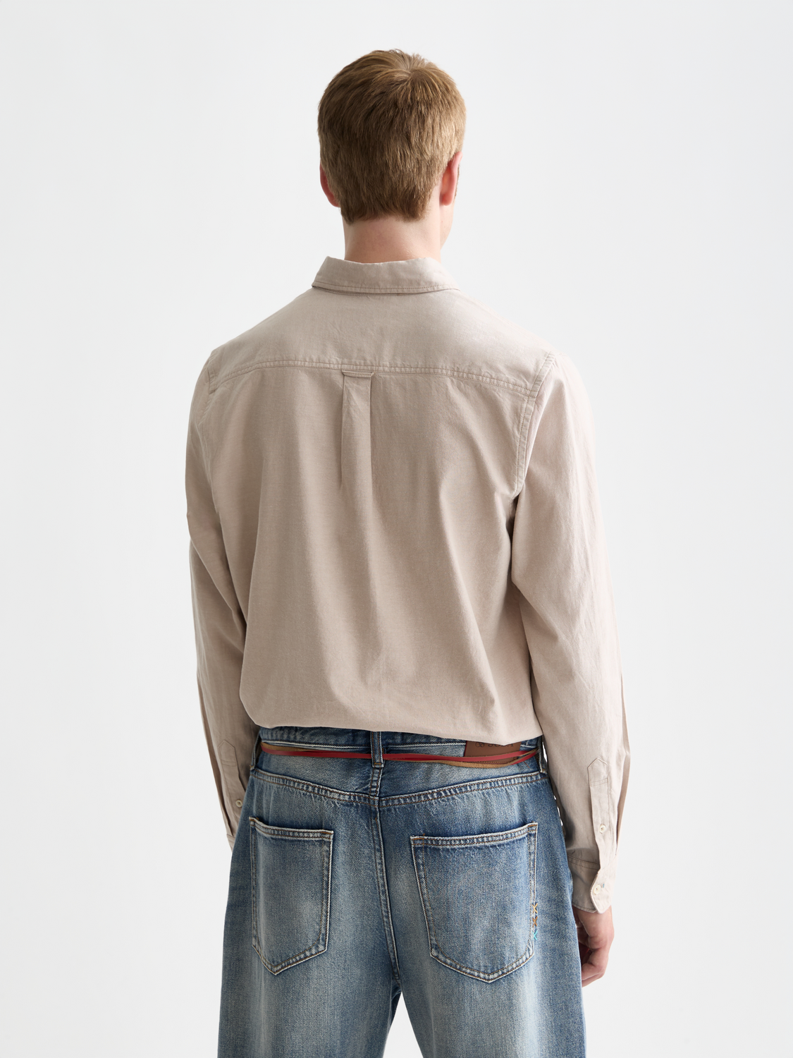Long-sleeve Oxford shirt by Scotch & Soda featuring a classic collar and button-front design, shown from the back.