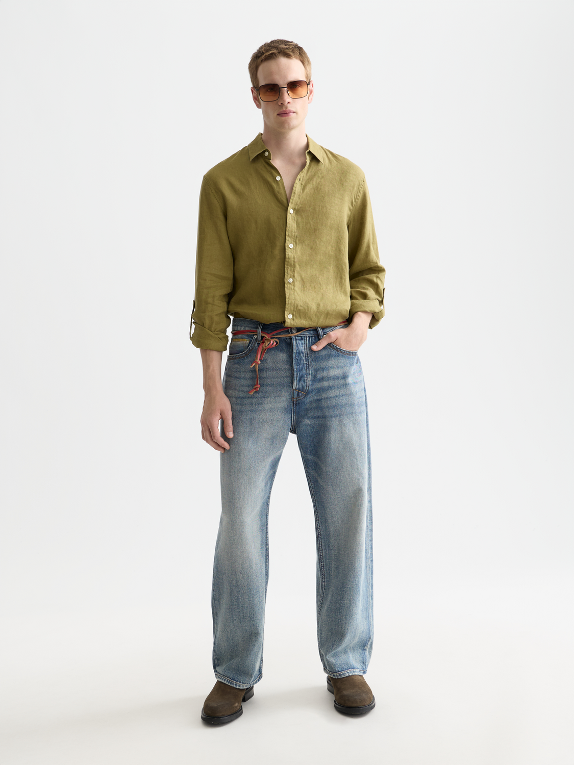 Long sleeve linen shirt by Scotch & Soda, shown in a natural fabric with a classic collar and button front.