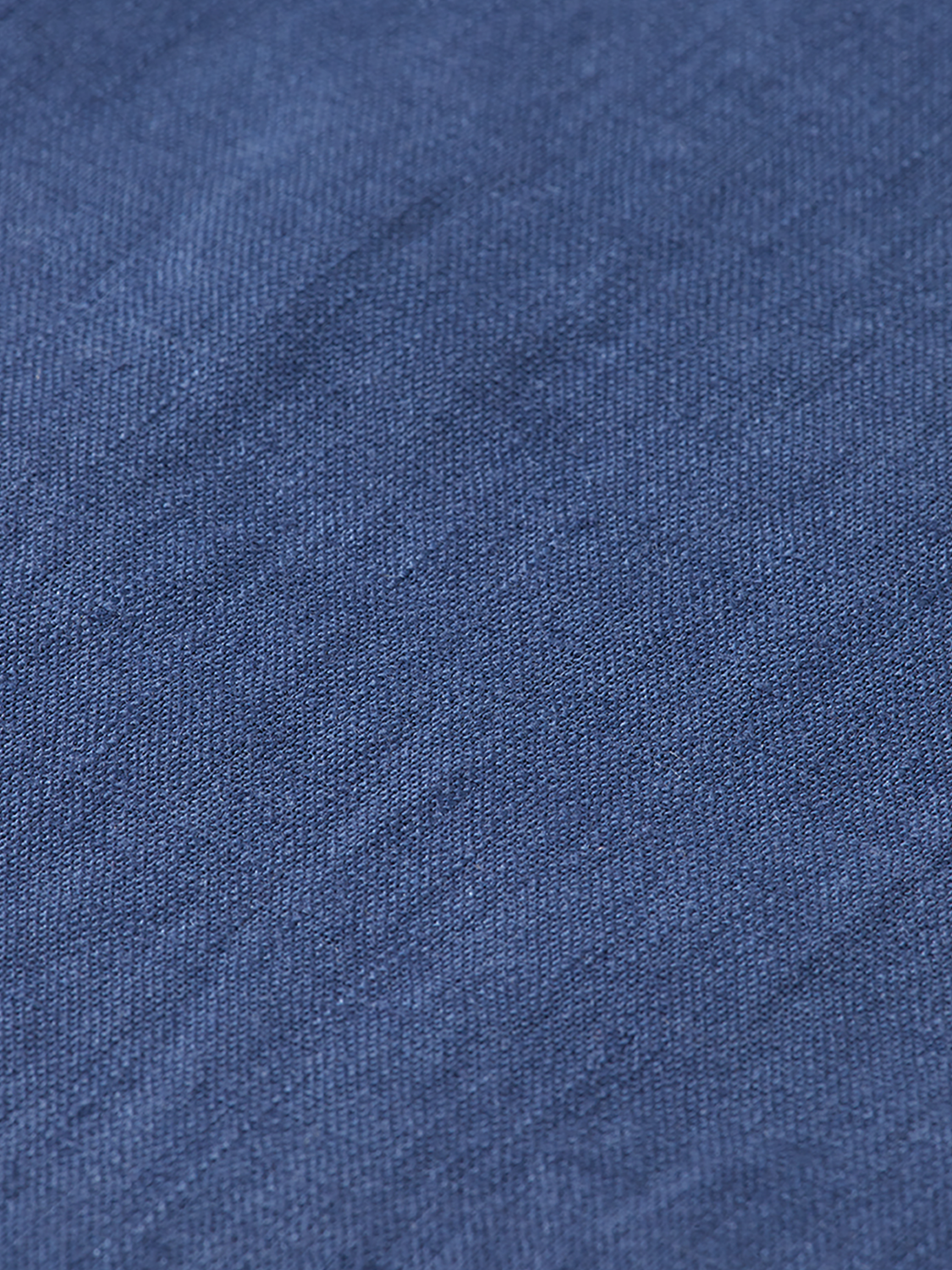 Long-sleeve linen shirt by Scotch & Soda, light and breathable fabric, displayed on a neutral background.