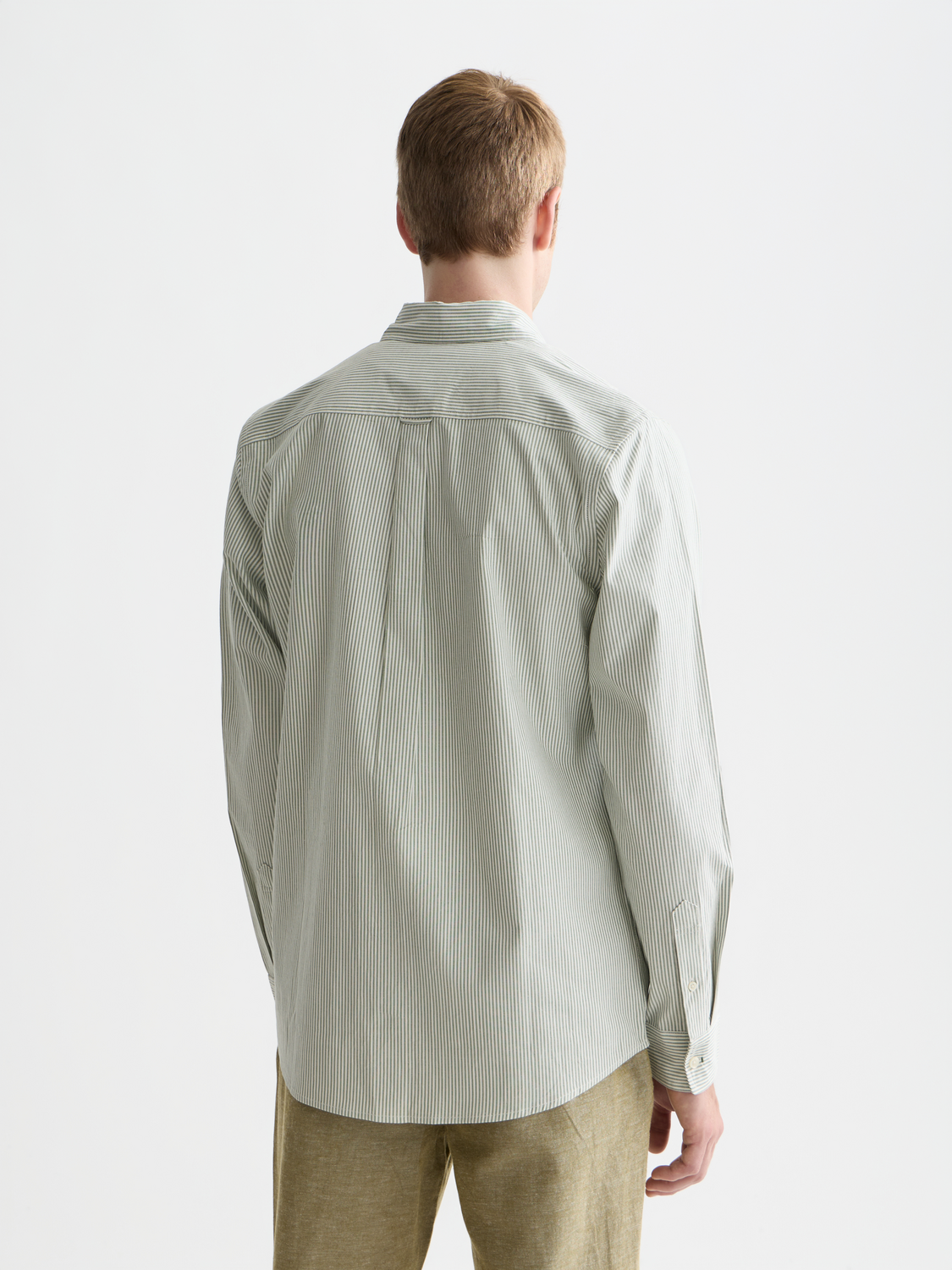 Scotch & Soda men's long-sleeve Oxford striped shirt with blue and white vertical stripes, button-down collar, and chest pocket.