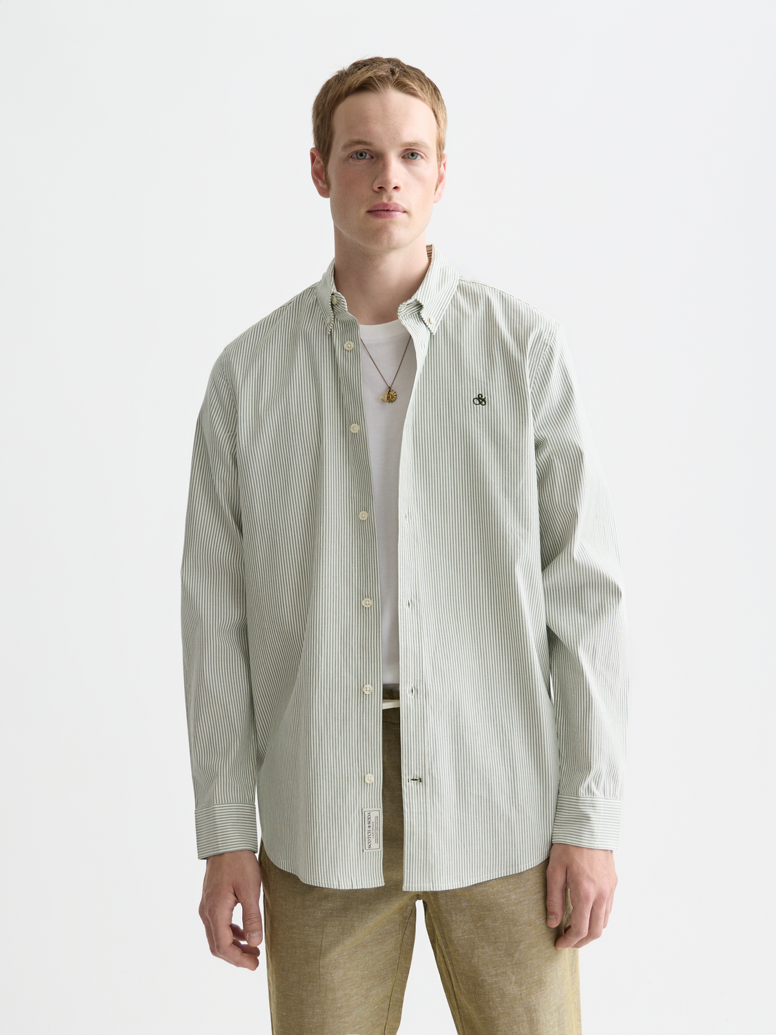 Long sleeve Scotch & Soda Oxford striped shirt with blue and white vertical stripes on crisp cotton fabric.