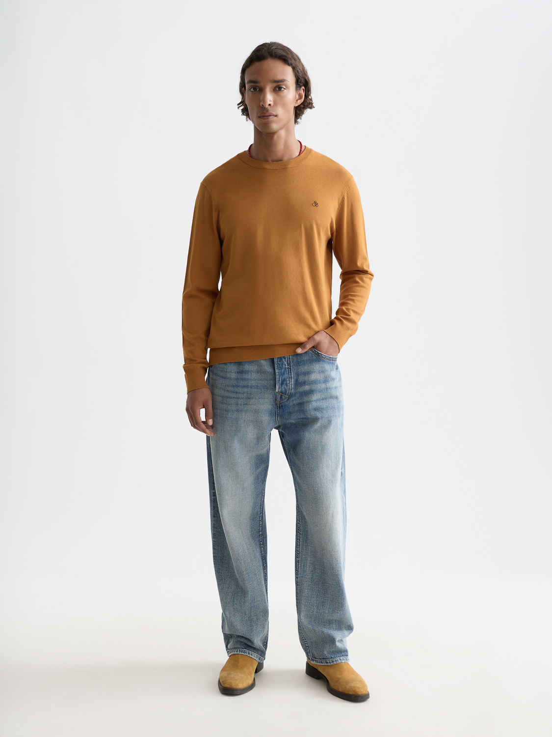 Navy viscose knit pullover by Scotch & Soda featuring a relaxed fit and ribbed cuffs, displayed on a plain background.