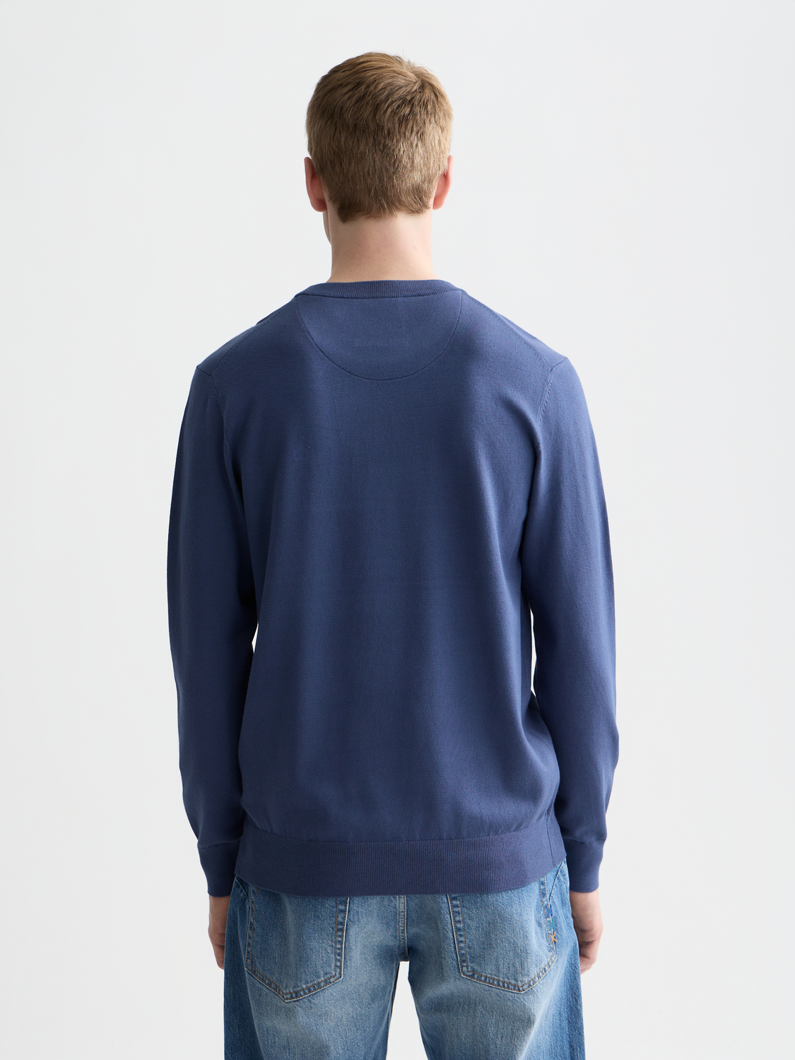 Scotch & Soda viscose pullover knitwear in a relaxed fit, shown from the back with a crisscross detail at the hem.