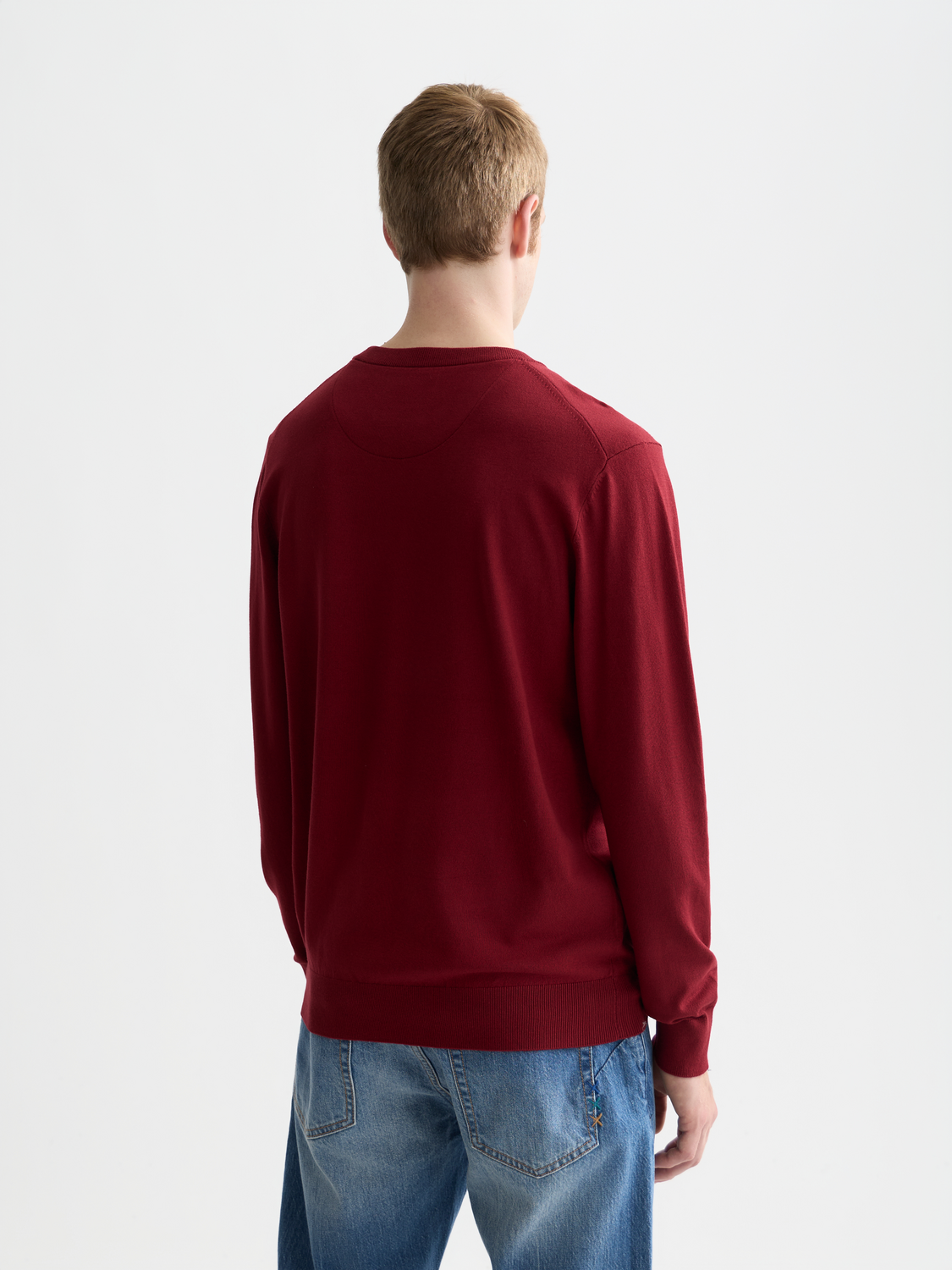 Scotch & Soda viscose knit pullover in black featuring a relaxed fit and soft fabric, displayed on a hanger.