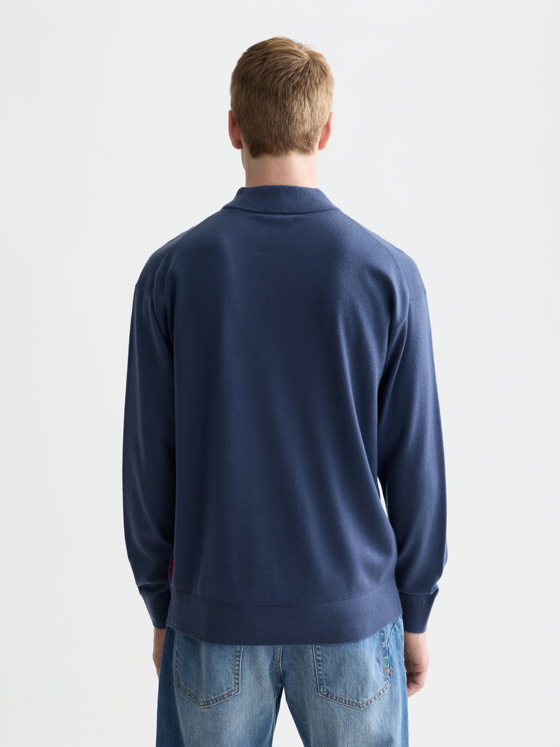SCOTCH & SODA dropped shoulder knitwear with mock neck, featuring a cozy, relaxed fit and textured fabric in the back view.