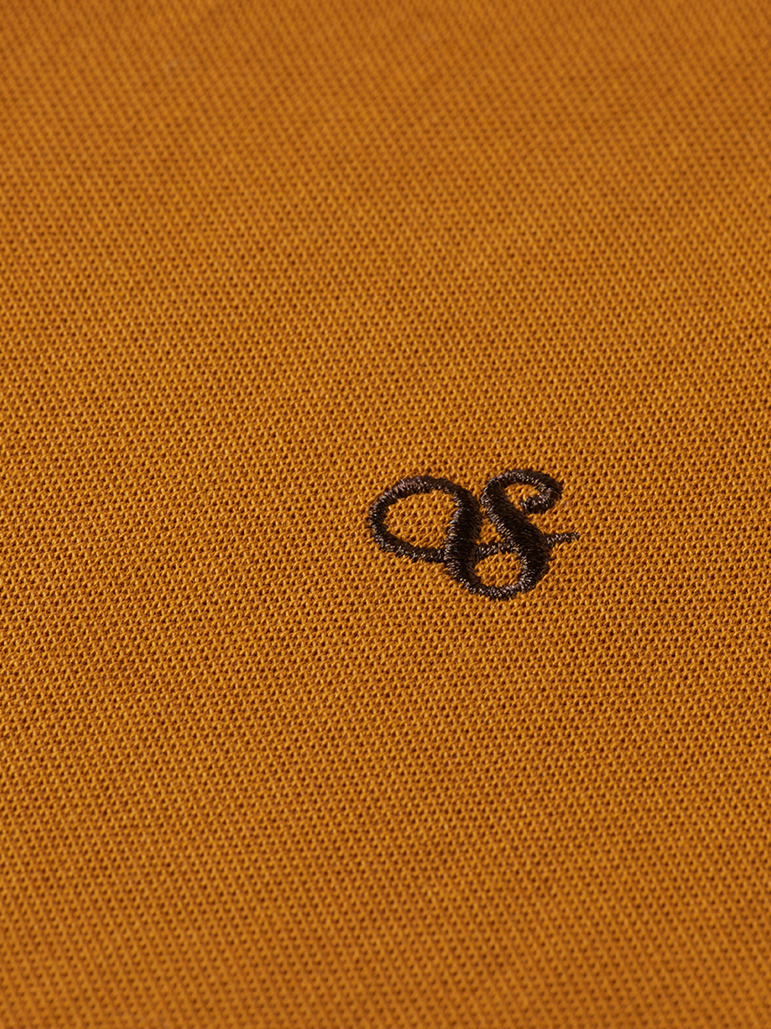 Navy Scotch & Soda logo pique polo shirt with a classic collar and short sleeves, displayed on a white background.