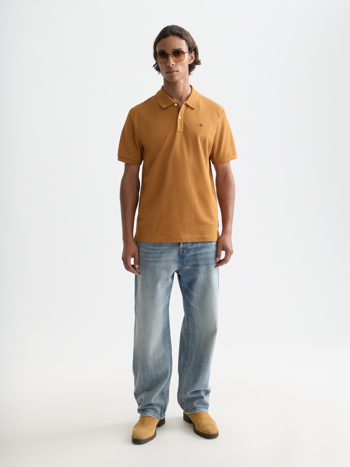 Navy Scotch & Soda logo pique polo shirt with a classic collar and short sleeves, stylish and comfortable for casual wear.