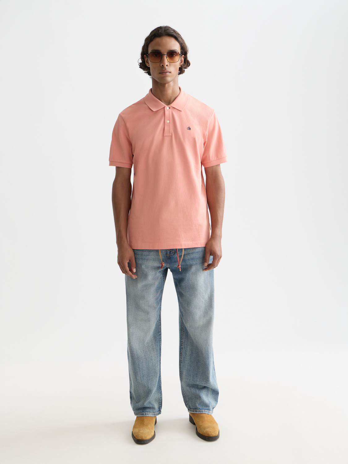 Navy Scotch & Soda logo pique polo shirt with short sleeves and classic collar, displayed flat.