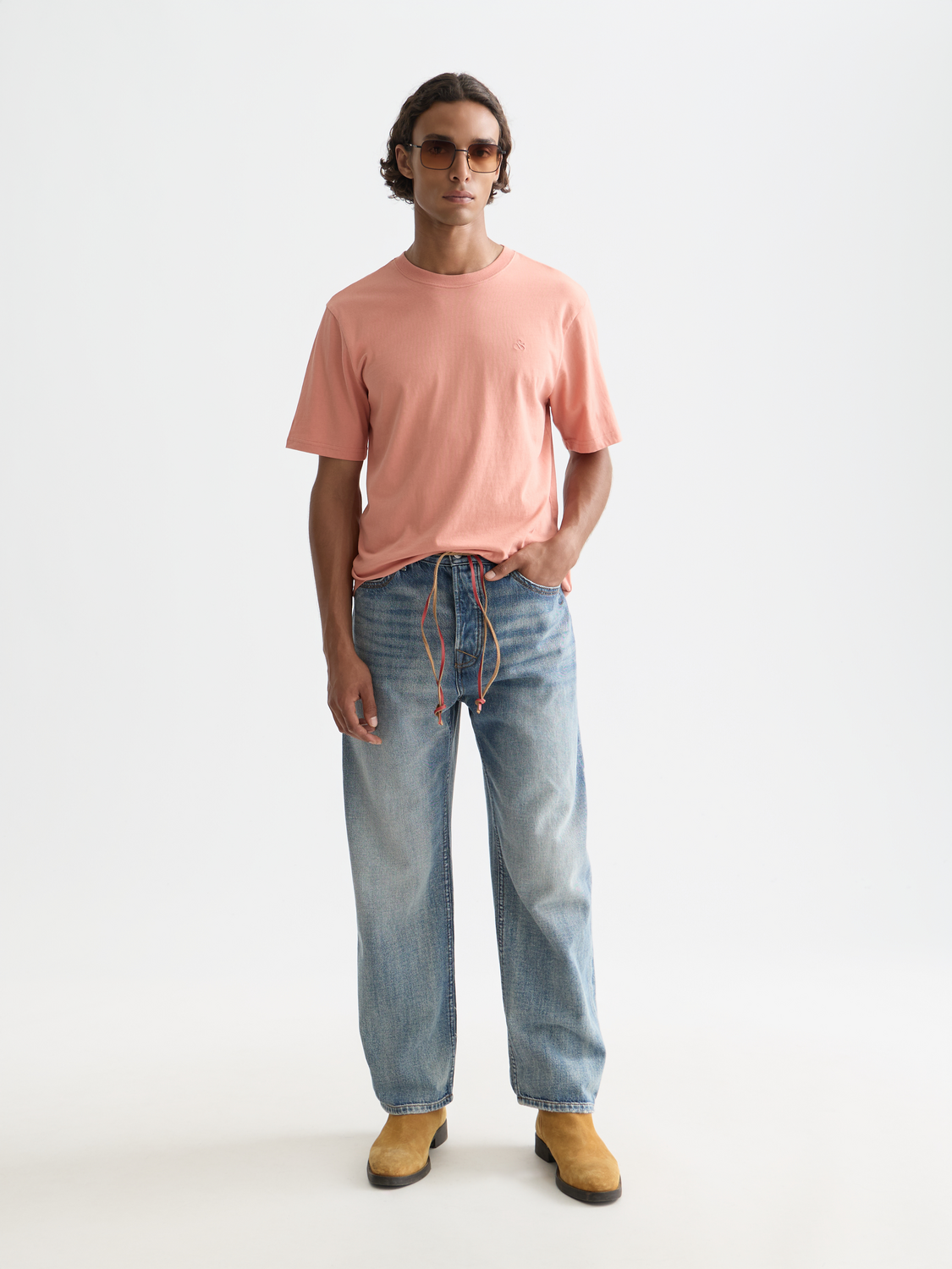 White short-sleeve logo t-shirt by Scotch & Soda featuring a stylish graphic on front.