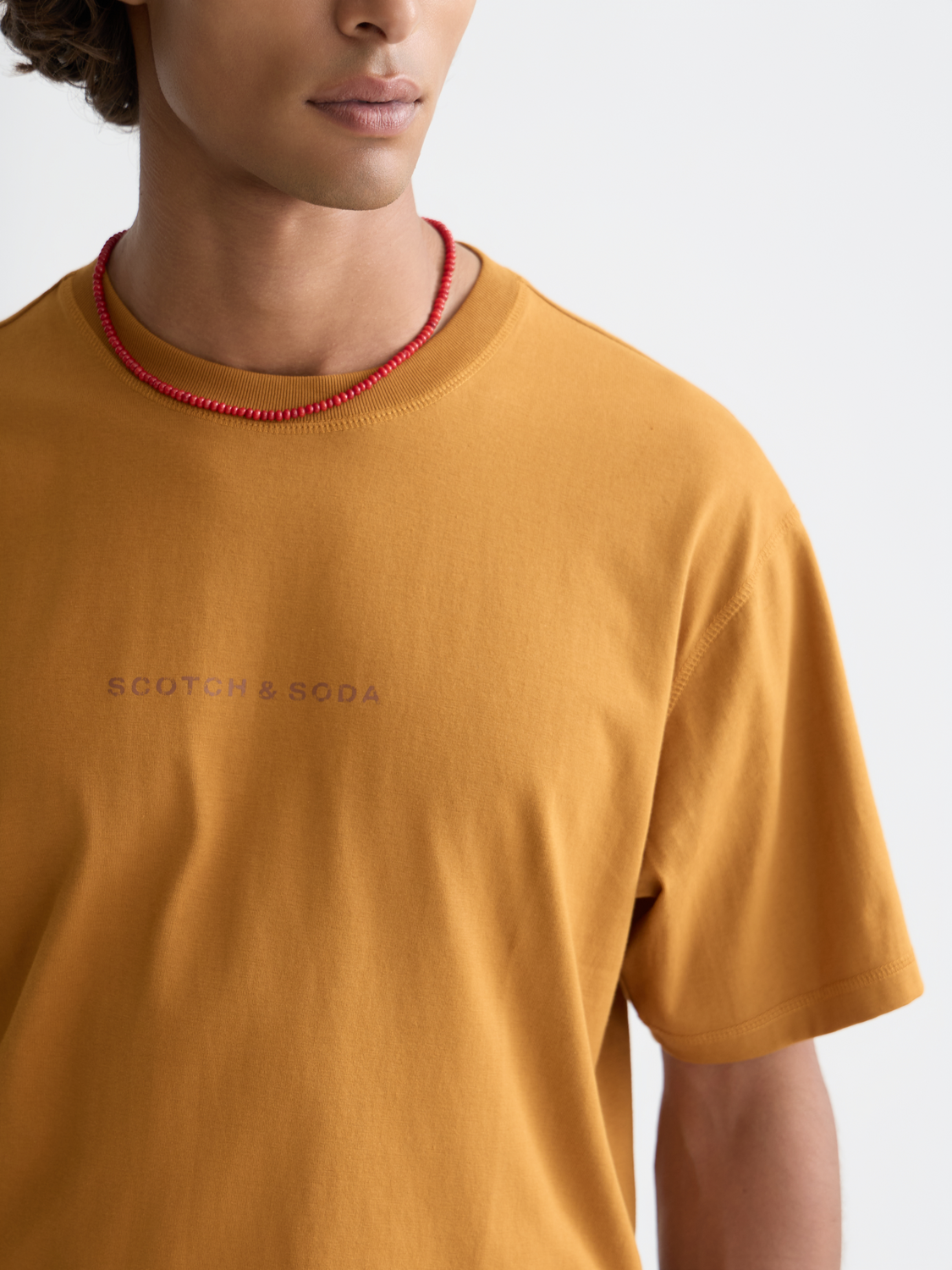 Short sleeve logo t-shirt from Scotch & Soda featuring a graphic logo design on soft cotton fabric.