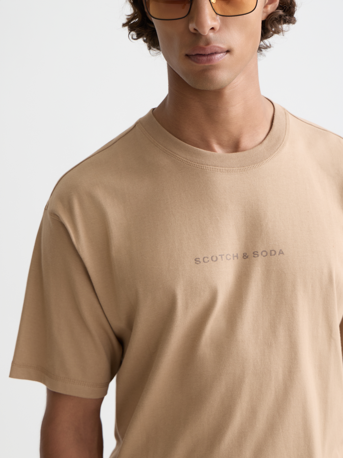 Short sleeve logo t-shirt by Scotch & Soda featuring a stylish graphic design on the front.