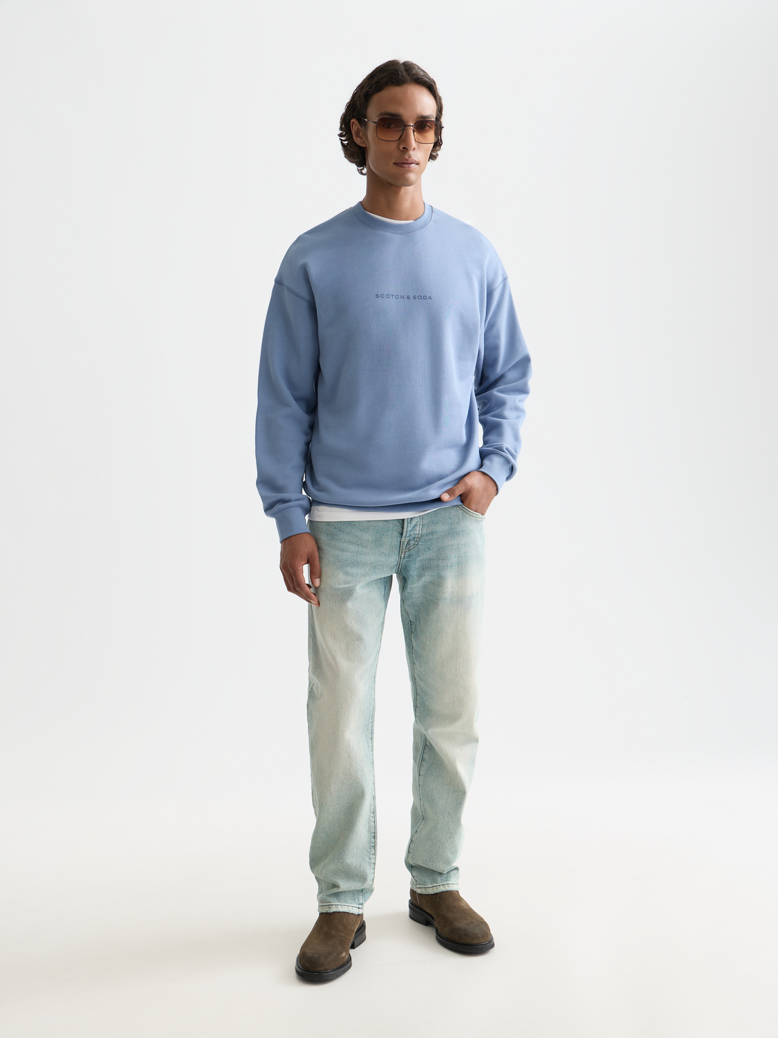 Scotch & Soda logo sweatshirt showing a casual gray sweatshirt with a front logo print and ribbed cuffs.